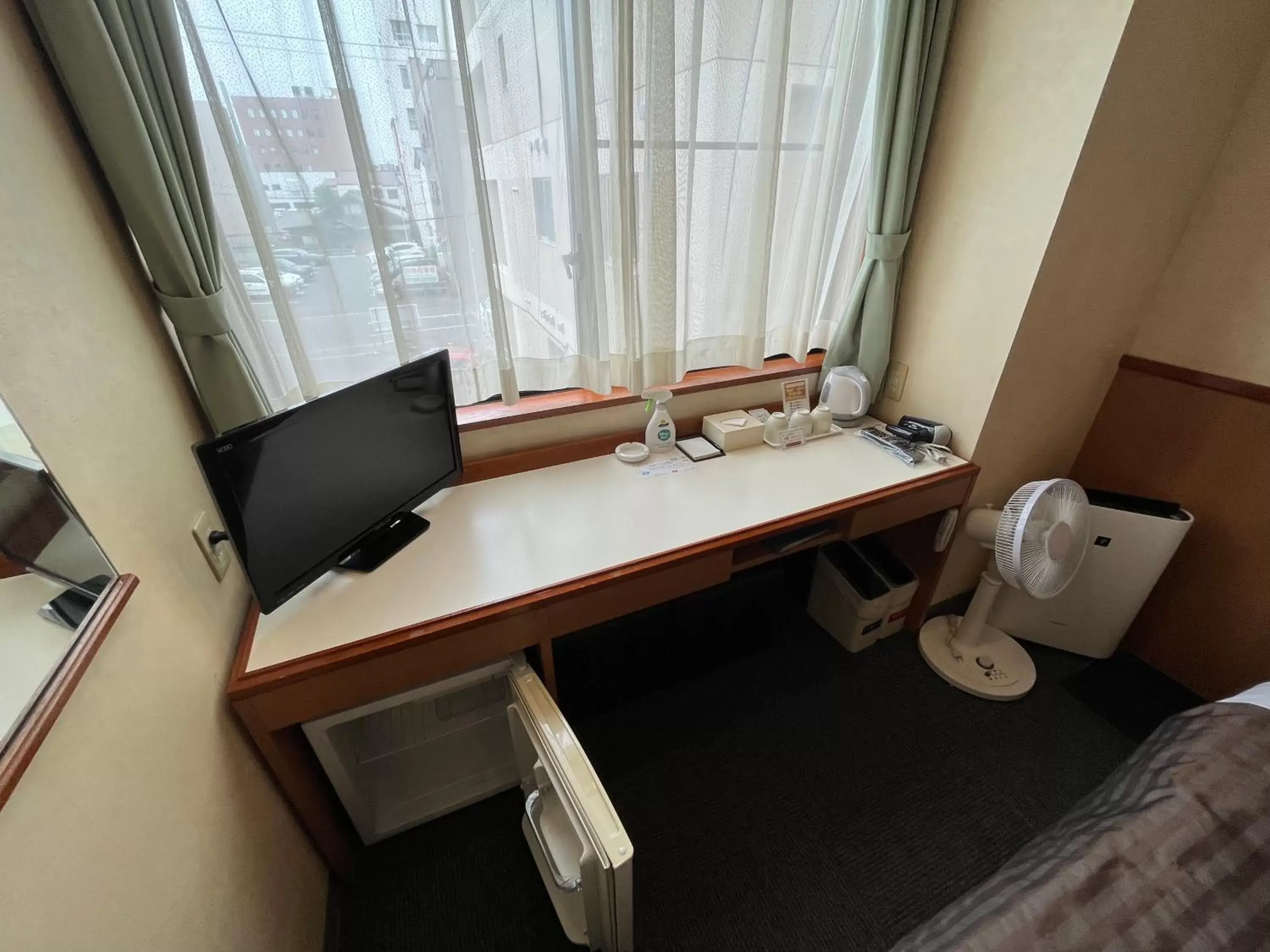 TV and multimedia, TV/Entertainment Center in Hotel Axia Inn Kushiro