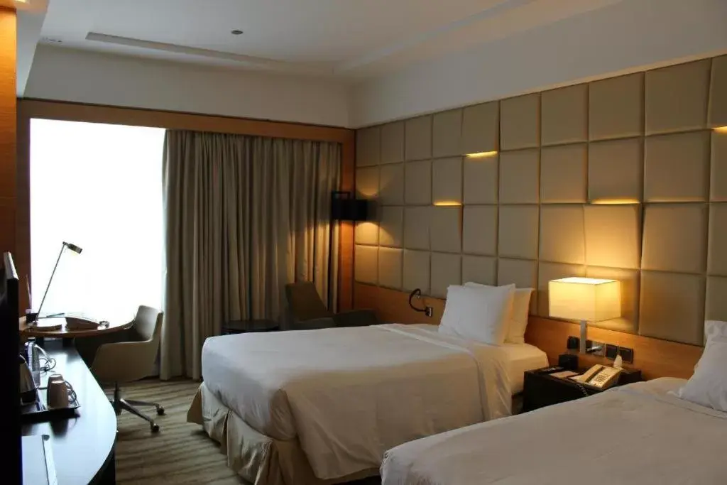 Bed in DoubleTree by Hilton Hotel Riyadh - Al Muroj Business Gate