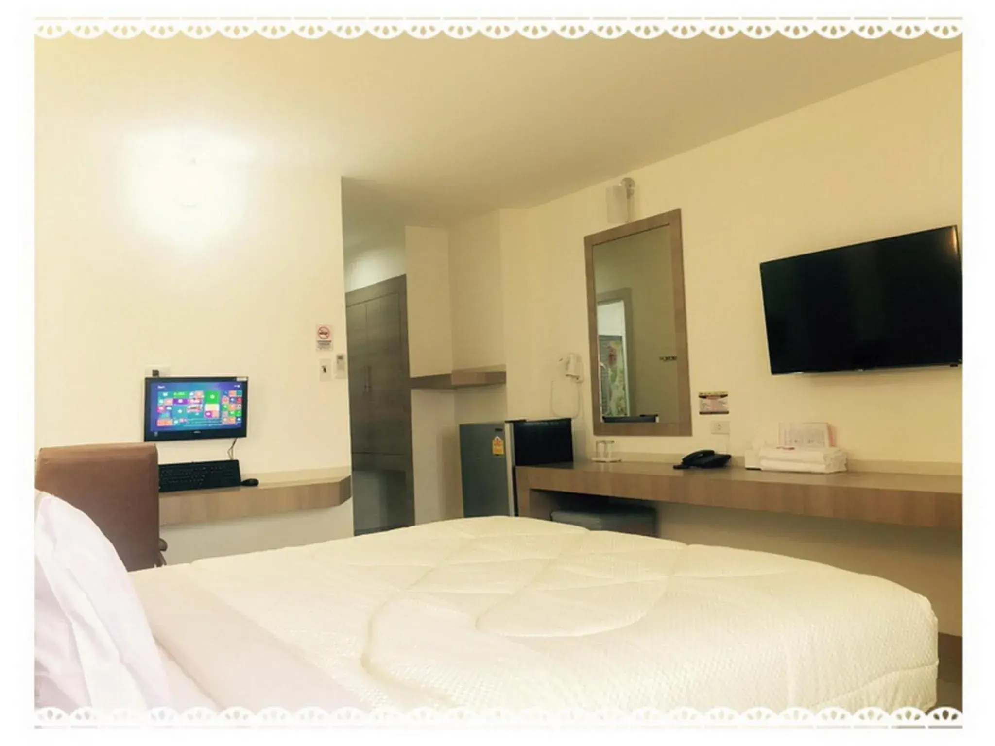 TV and multimedia, TV/Entertainment Center in P.A. Thani Hotel