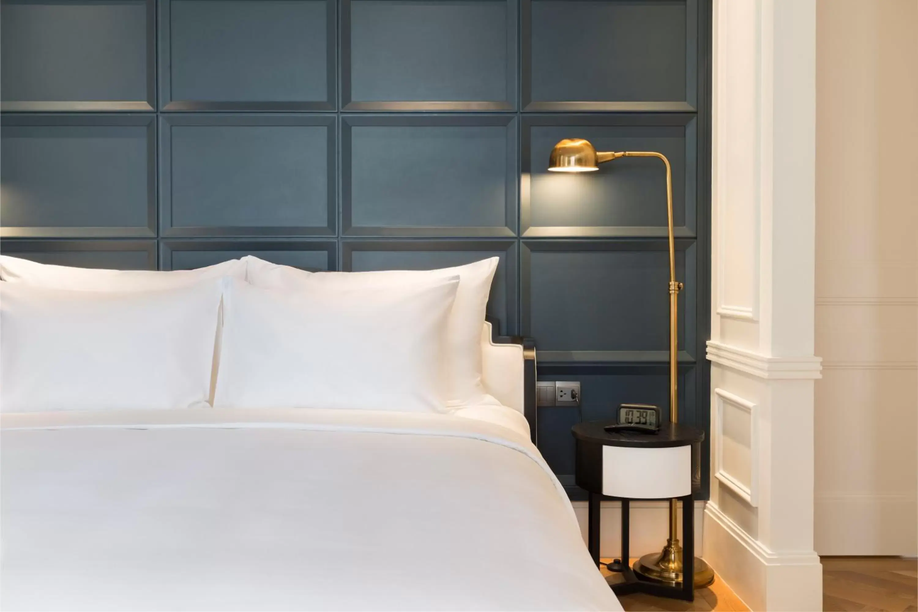 Bed in Bach Suites Saigon, a Member of Design Hotels