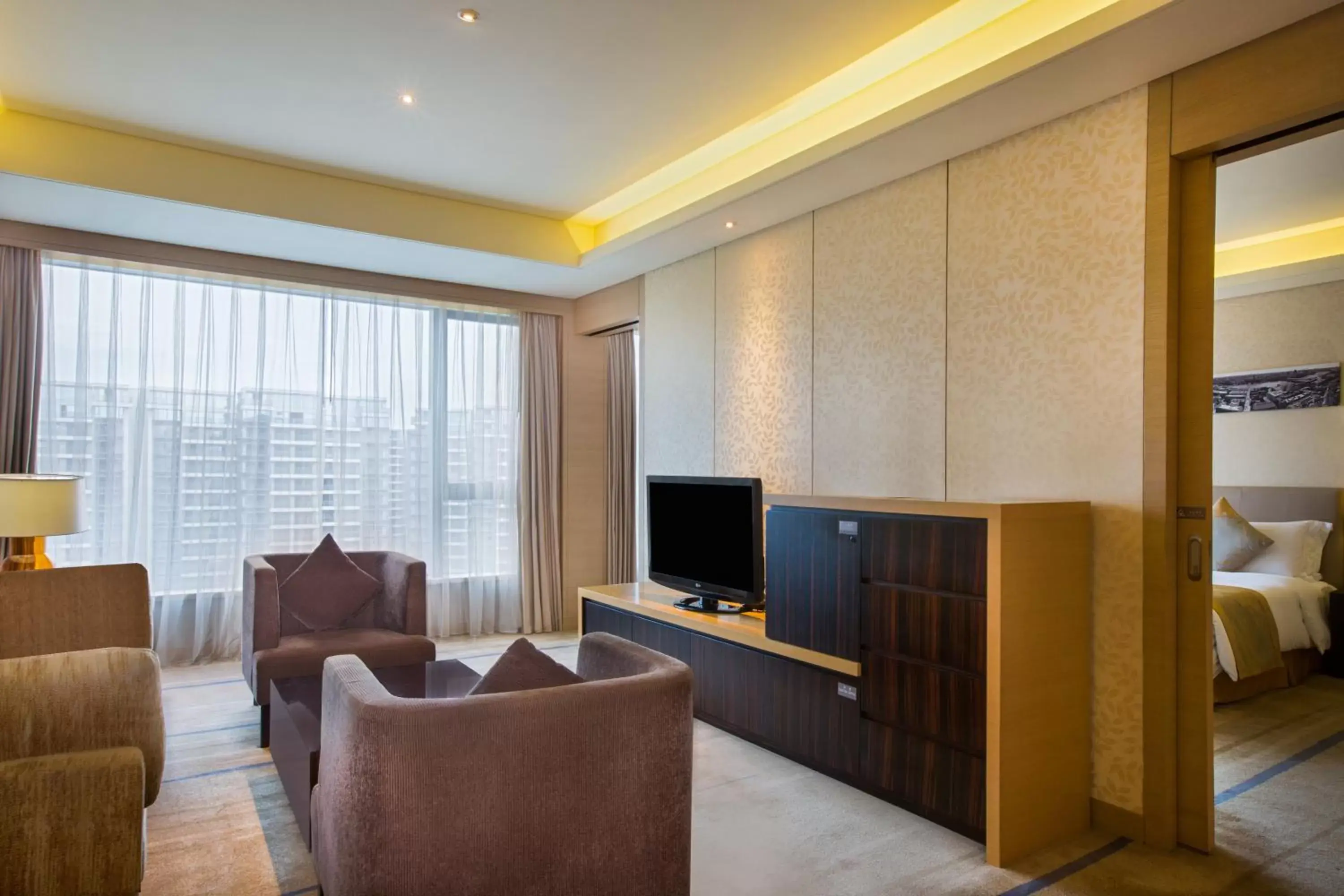 Photo of the whole room, Seating Area in Crowne Plaza Guangzhou Huadu, an IHG Hotel