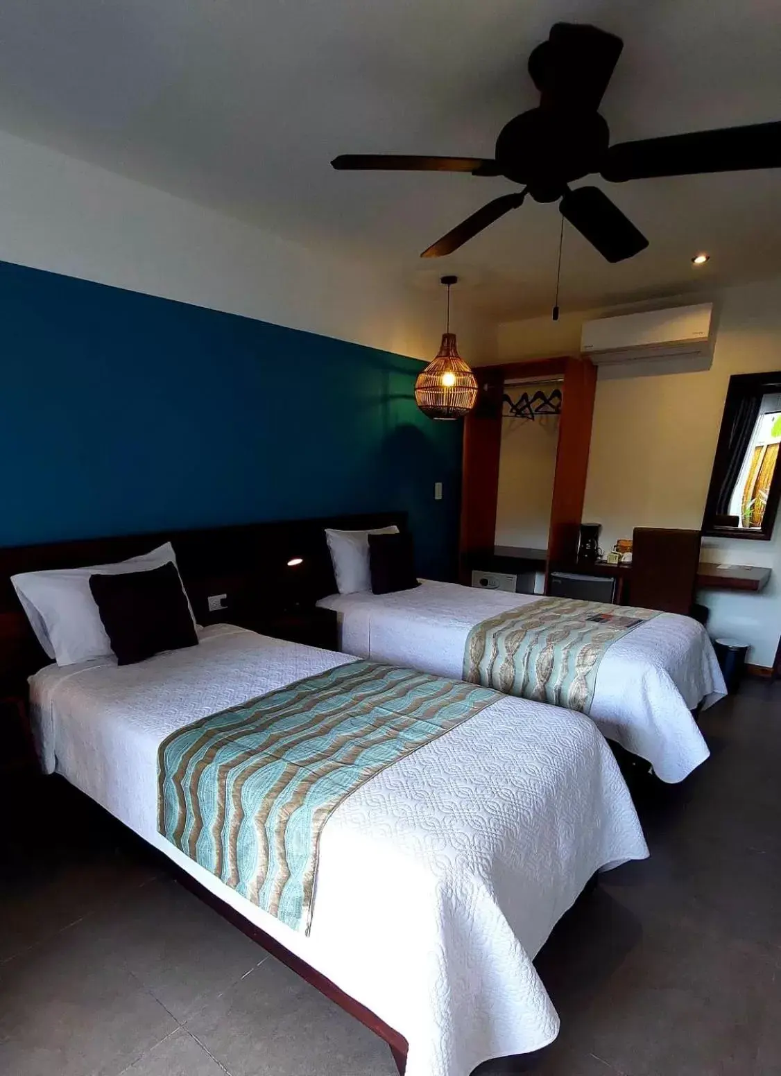 Bed in La Fortuna Lodge by Treebu Hotels