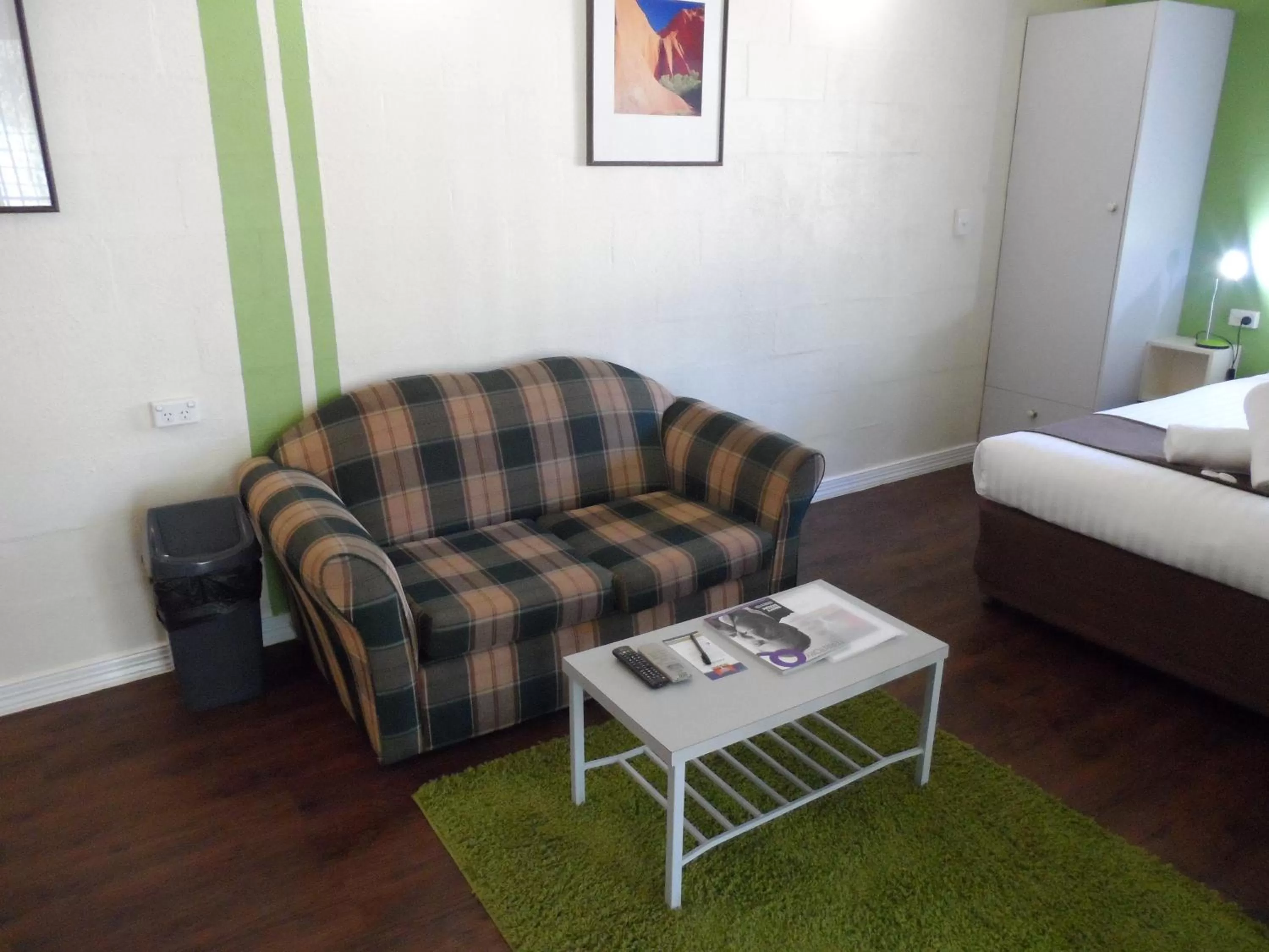 Living room, Bed in Alice On Todd Apartments