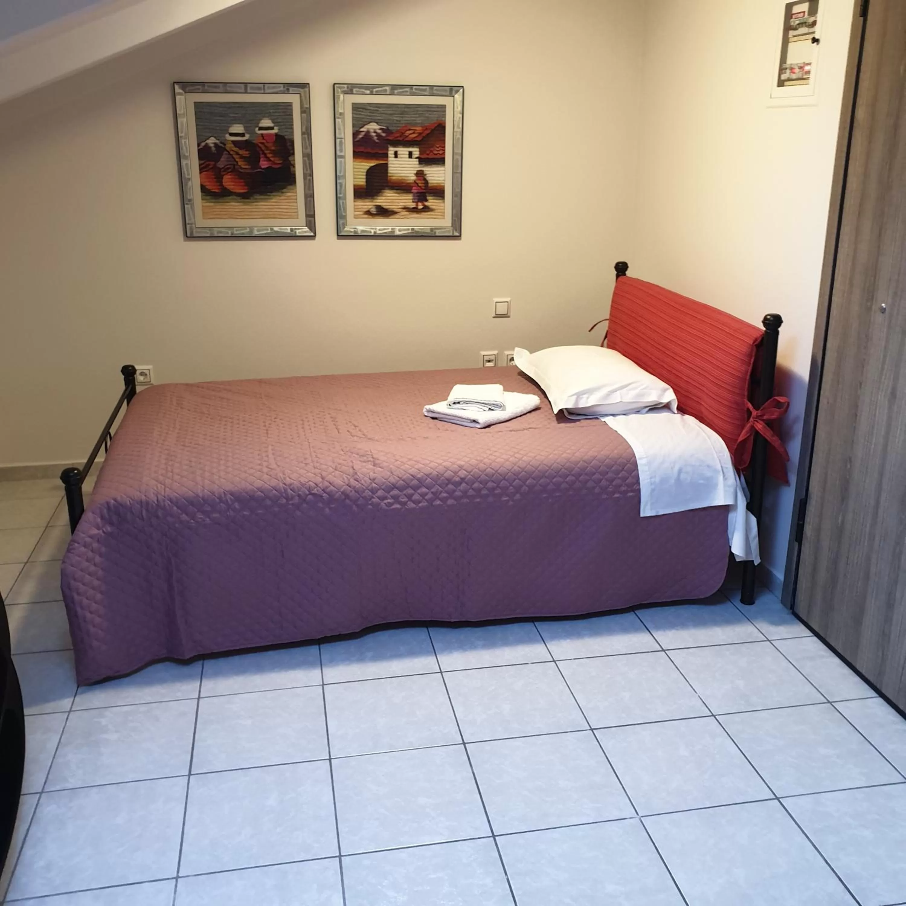 Bed in Alexia's Apartments