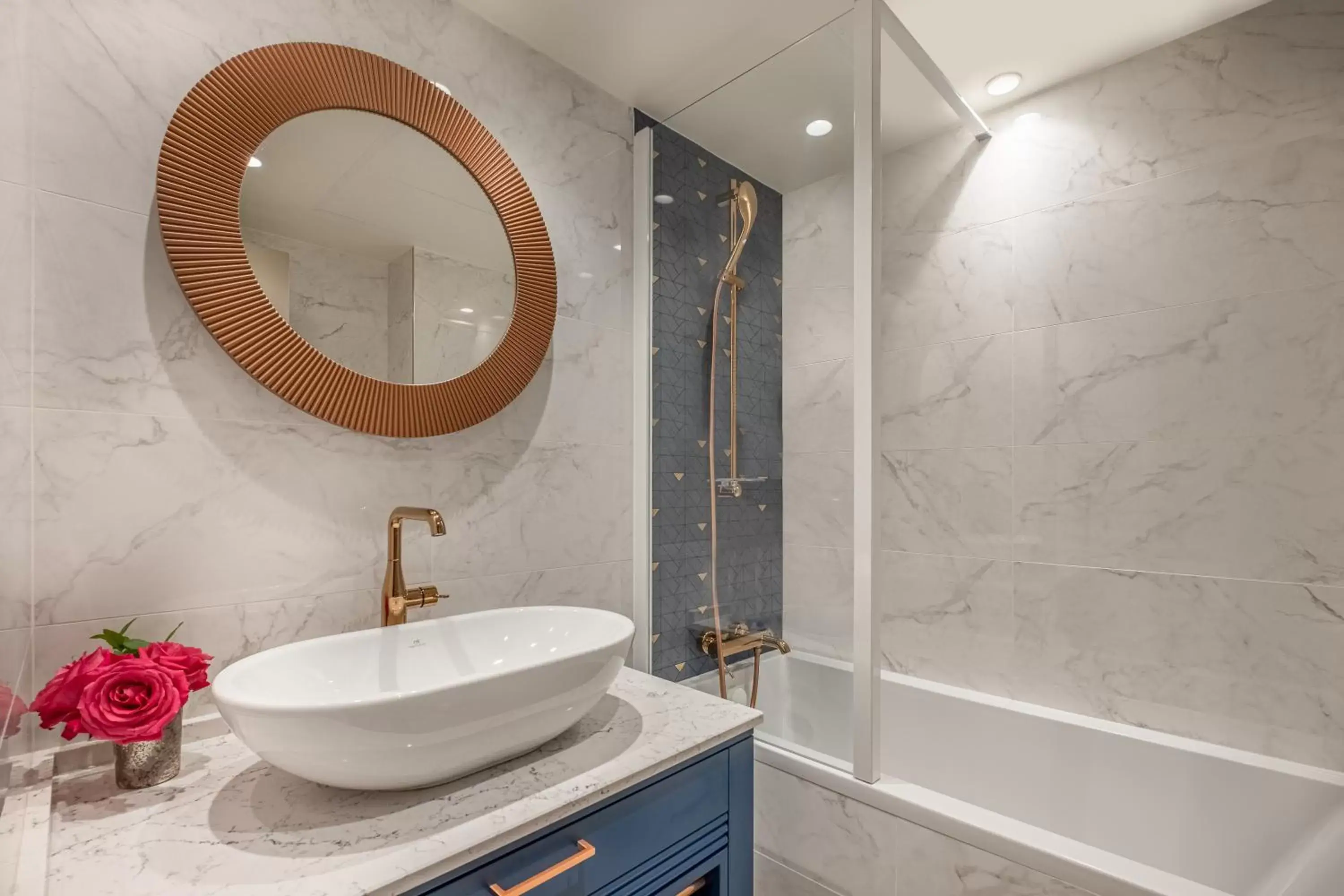 Bathroom in Hôtel Le Tourville by Inwood Hotels