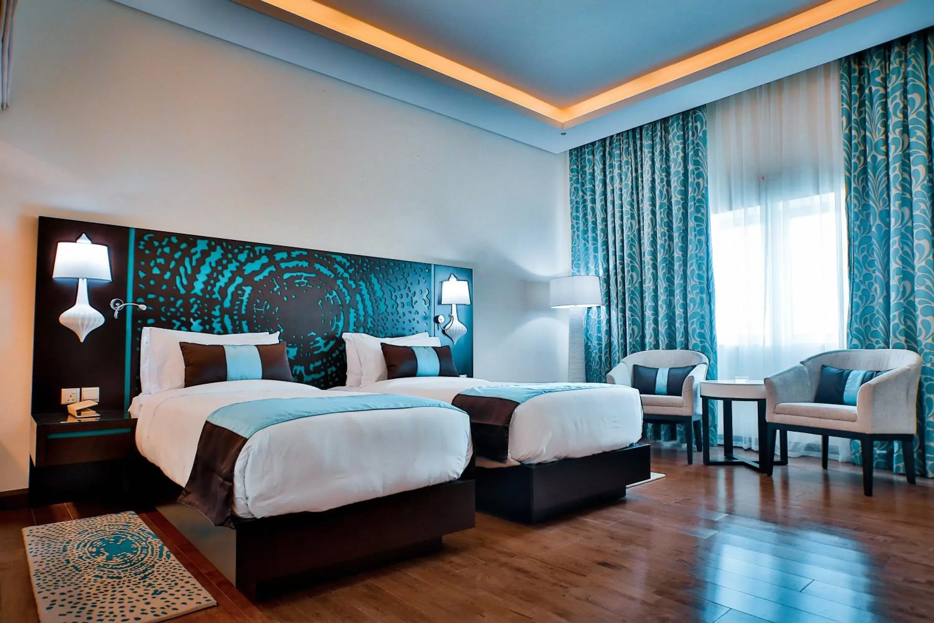 Seating area, Bed in Signature Hotel Al Barsha