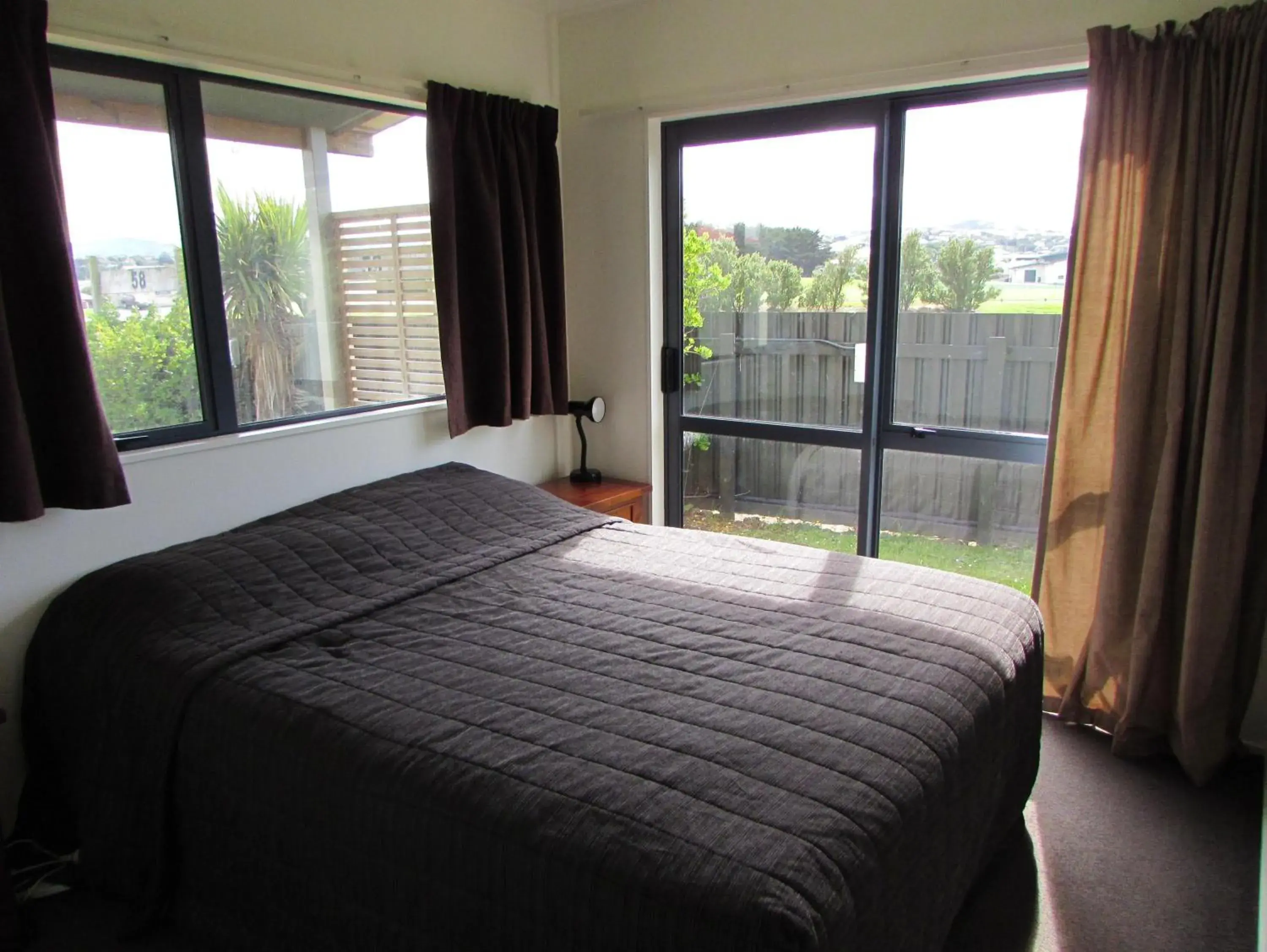 Bedroom, Bed in Dunedin Holiday Park