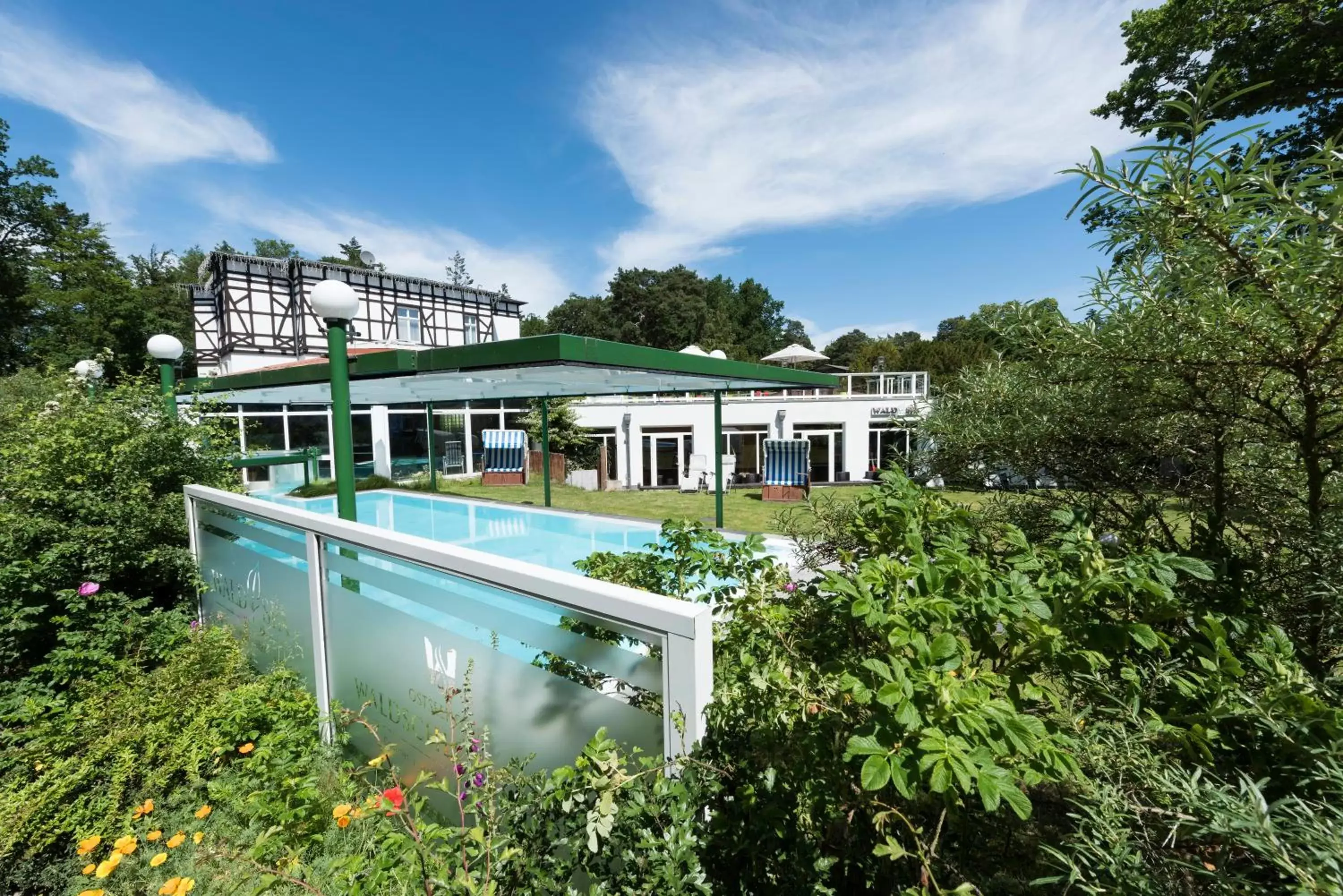 Property building, Swimming Pool in Best Western Plus Ostseehotel Waldschloesschen