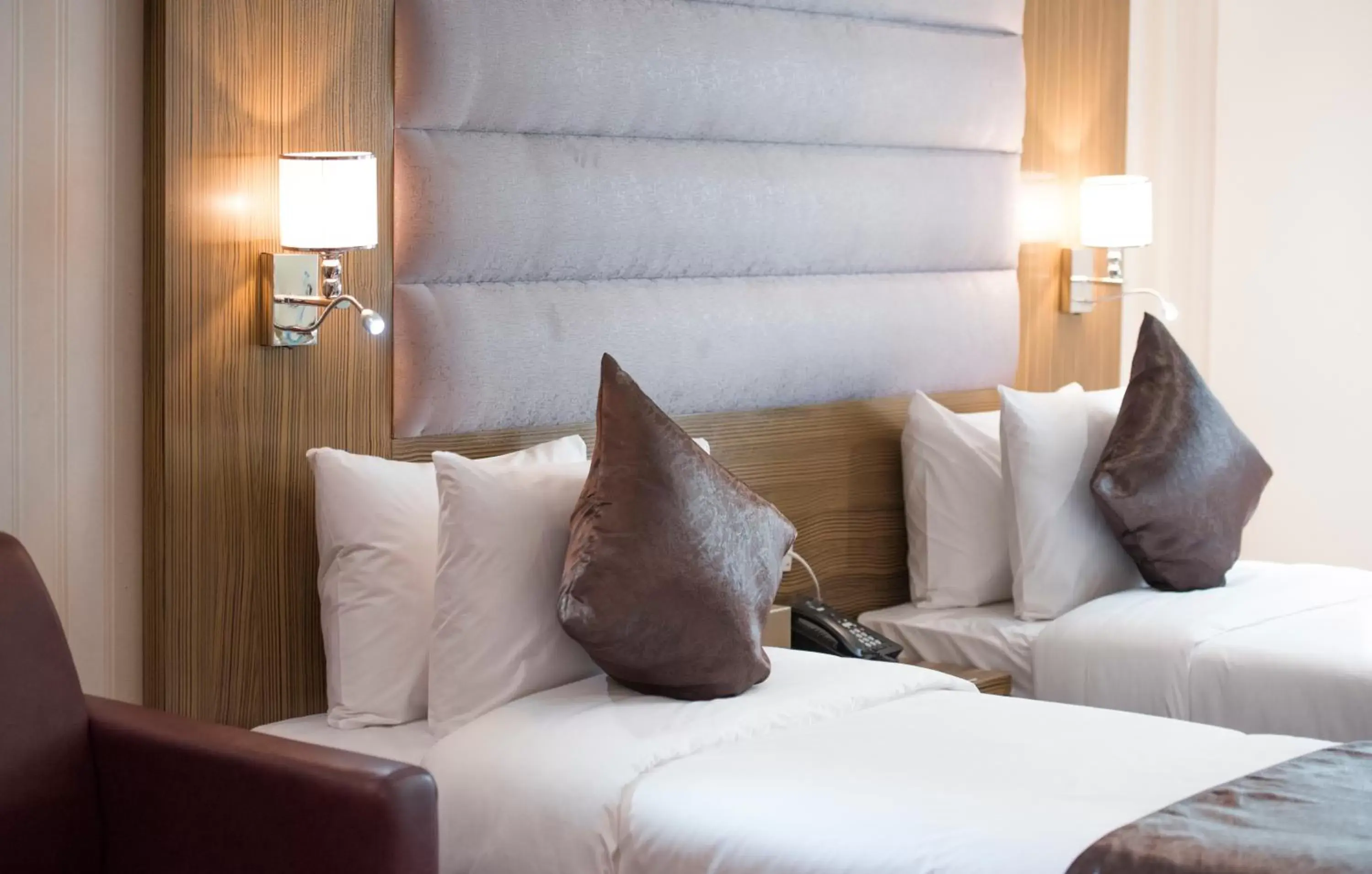 Bed in Royal Tulip Hotel LLC