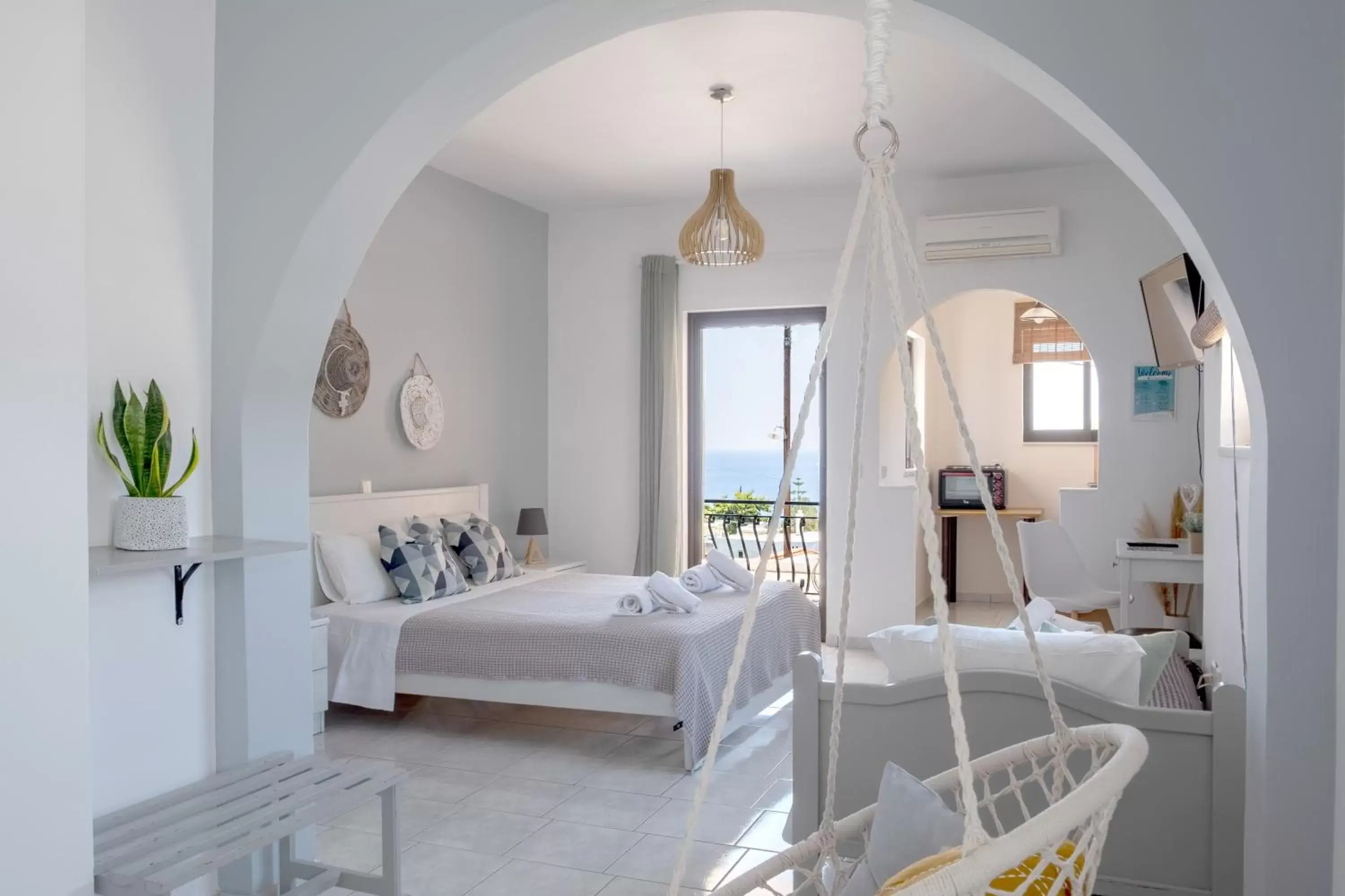 Photo of the whole room in Pefkides Aegina Boutique Apartments