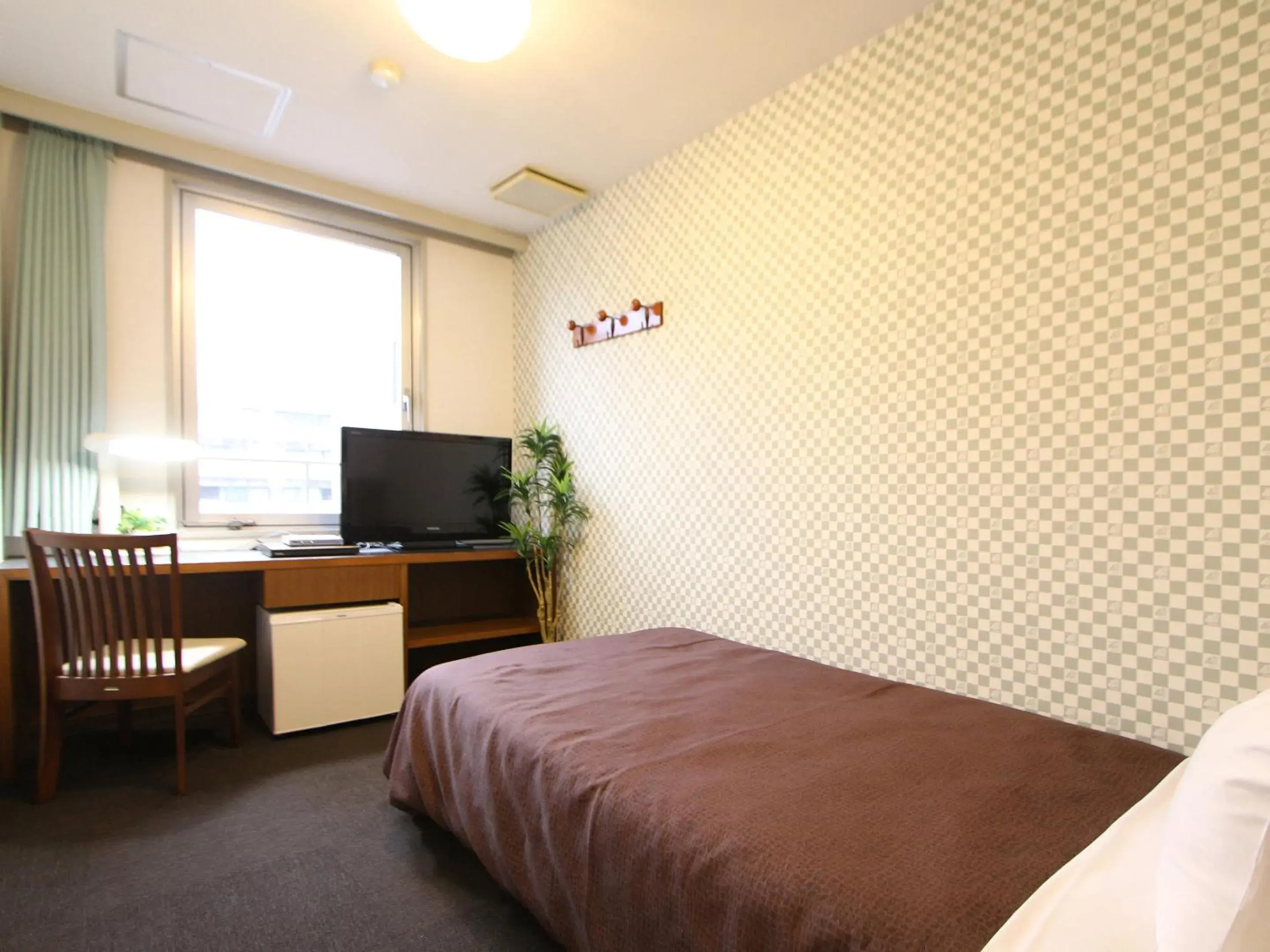 Bed in HOTEL LiVEMAX BUDGET Tokyo Kiba