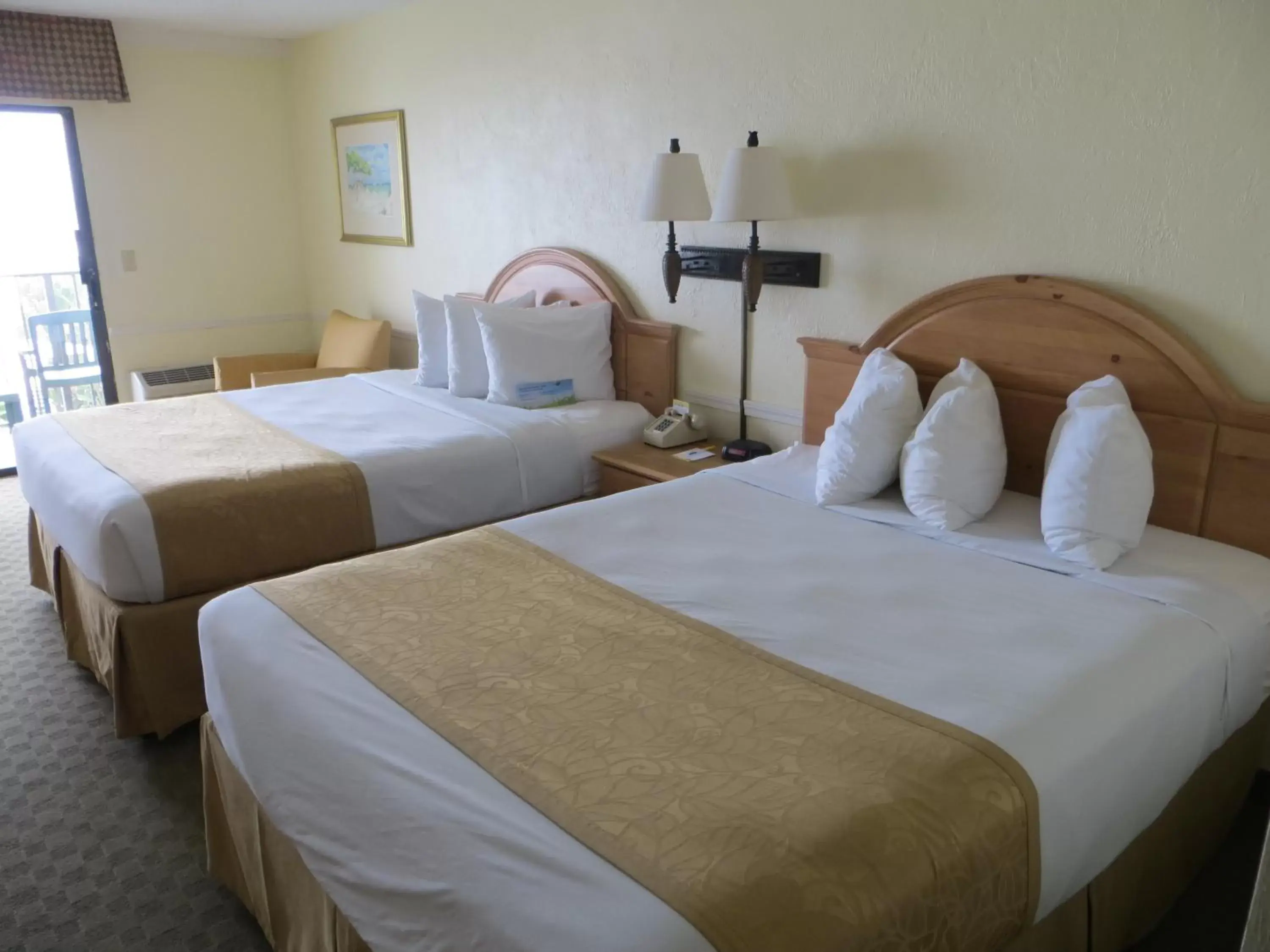 Bed in Days Inn by Wyndham Daytona Oceanfront