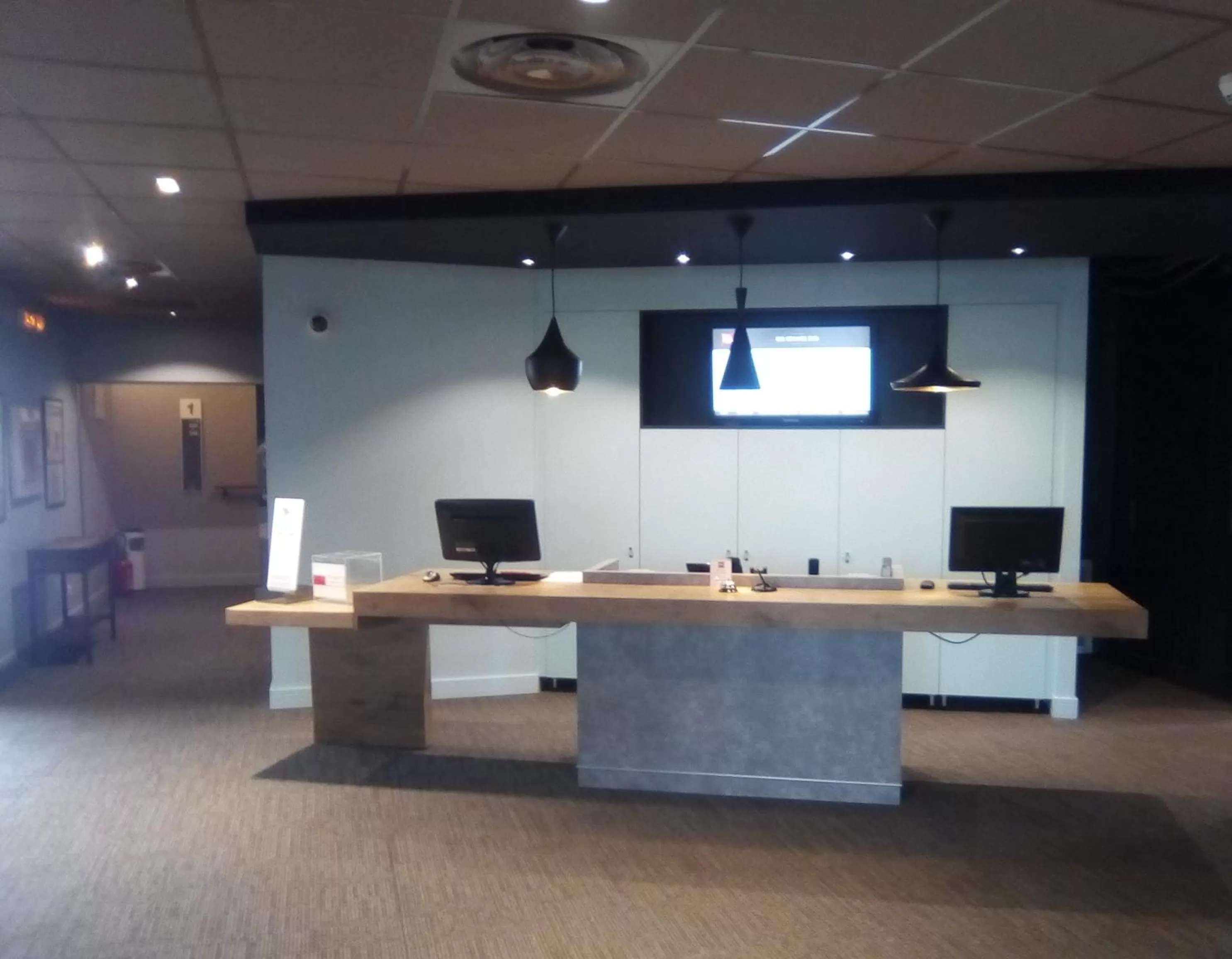 Lobby or reception in ibis Orange Sud
