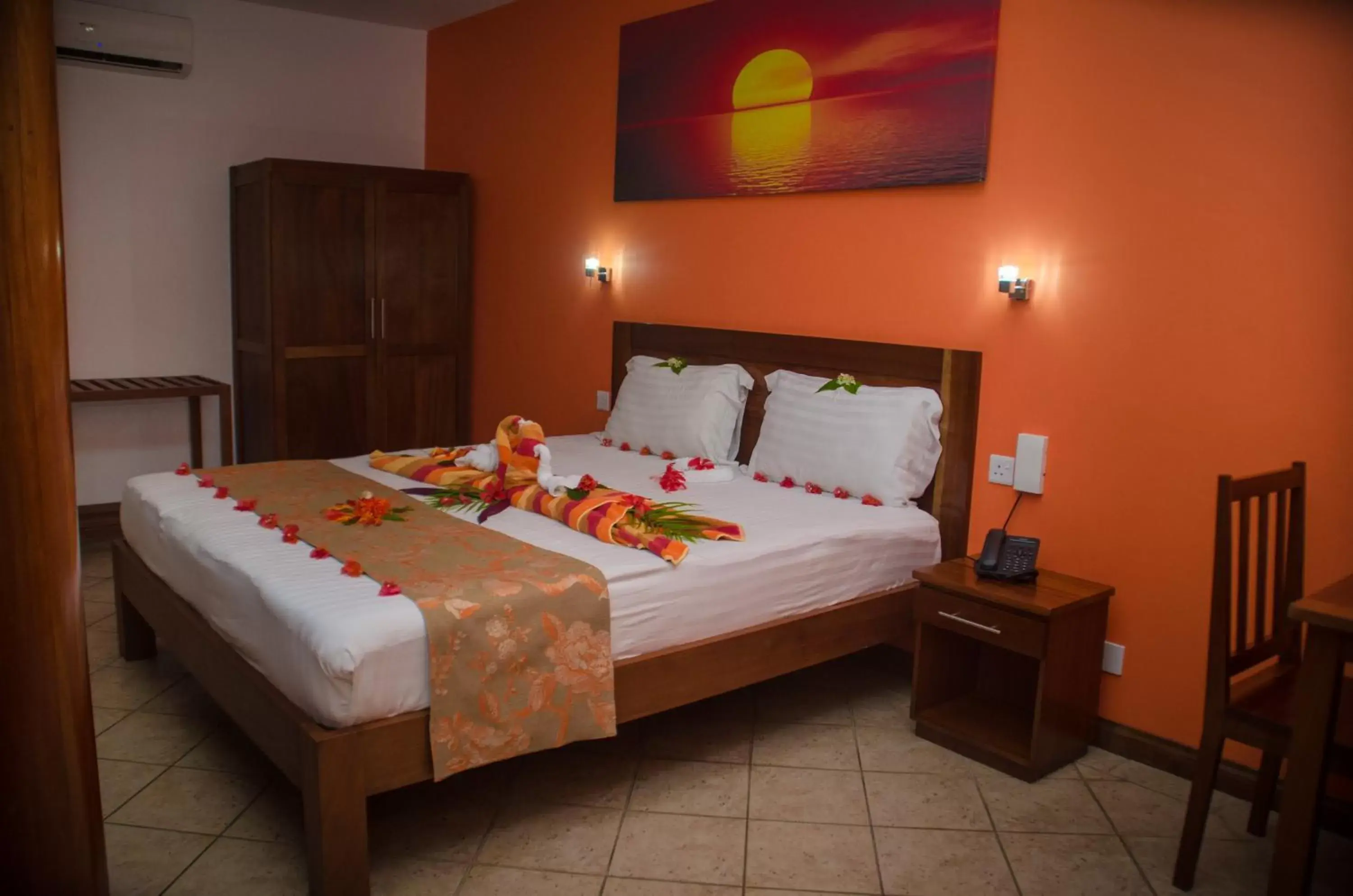Bed in Sunset Reef Resort & Spa