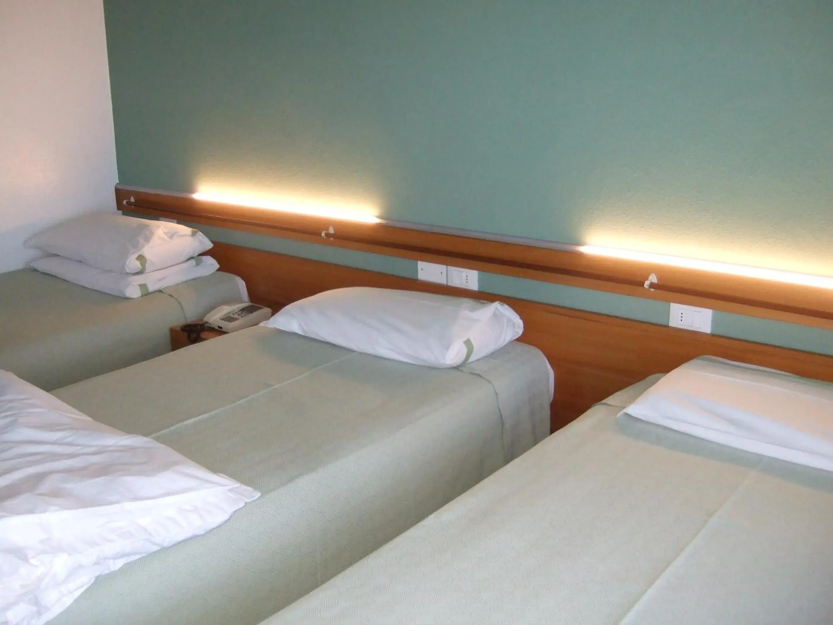 Bed in Hotel Canturio