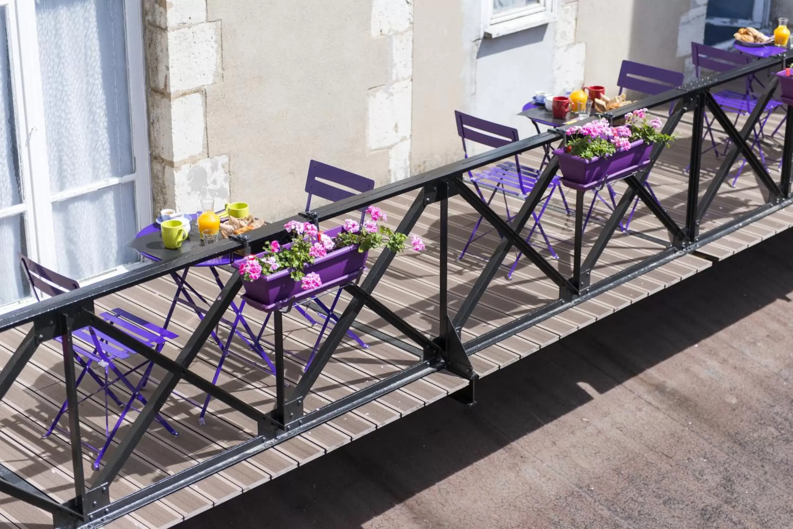 Balcony/Terrace in Logis Hôtel Central