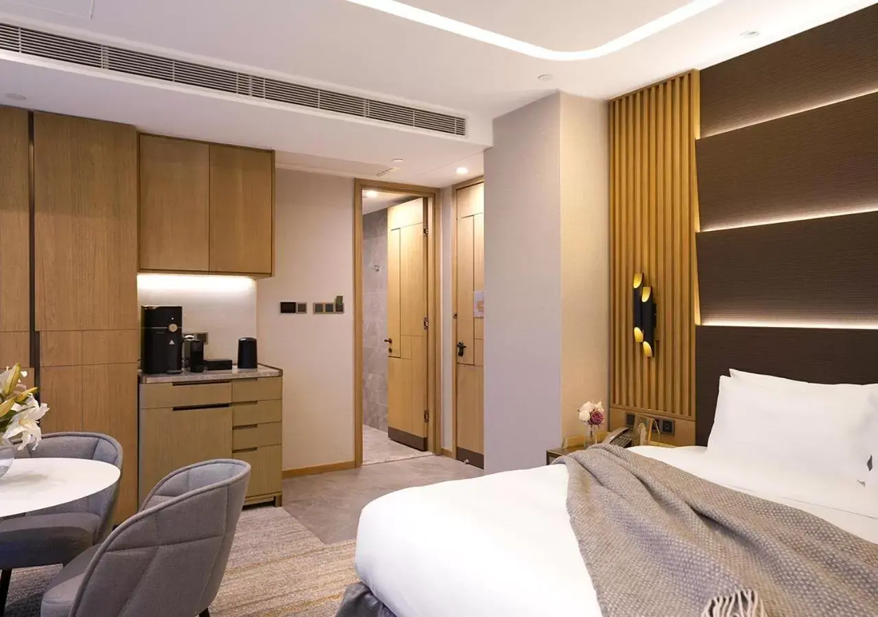 Bed in One-Eight-One Hotel & Serviced Residences