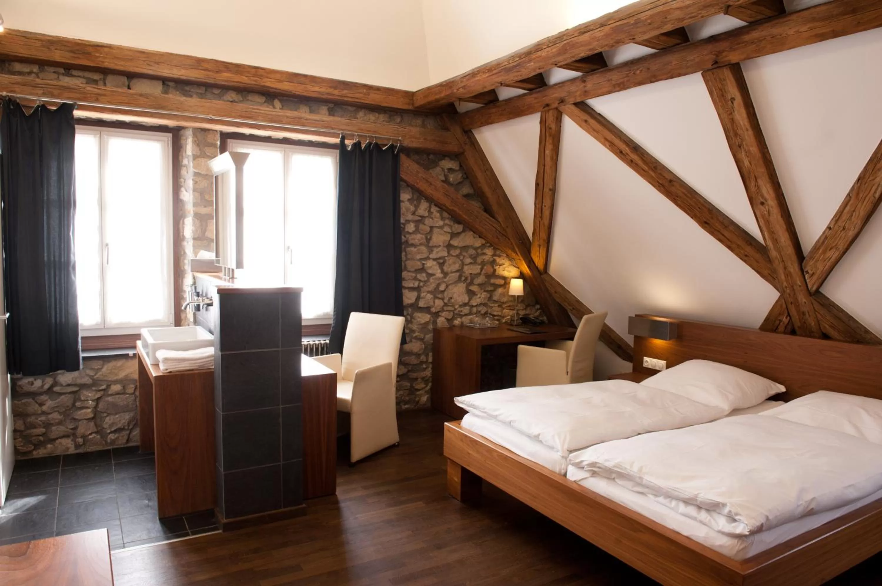 Photo of the whole room, Bed in Weinhotel Koegler