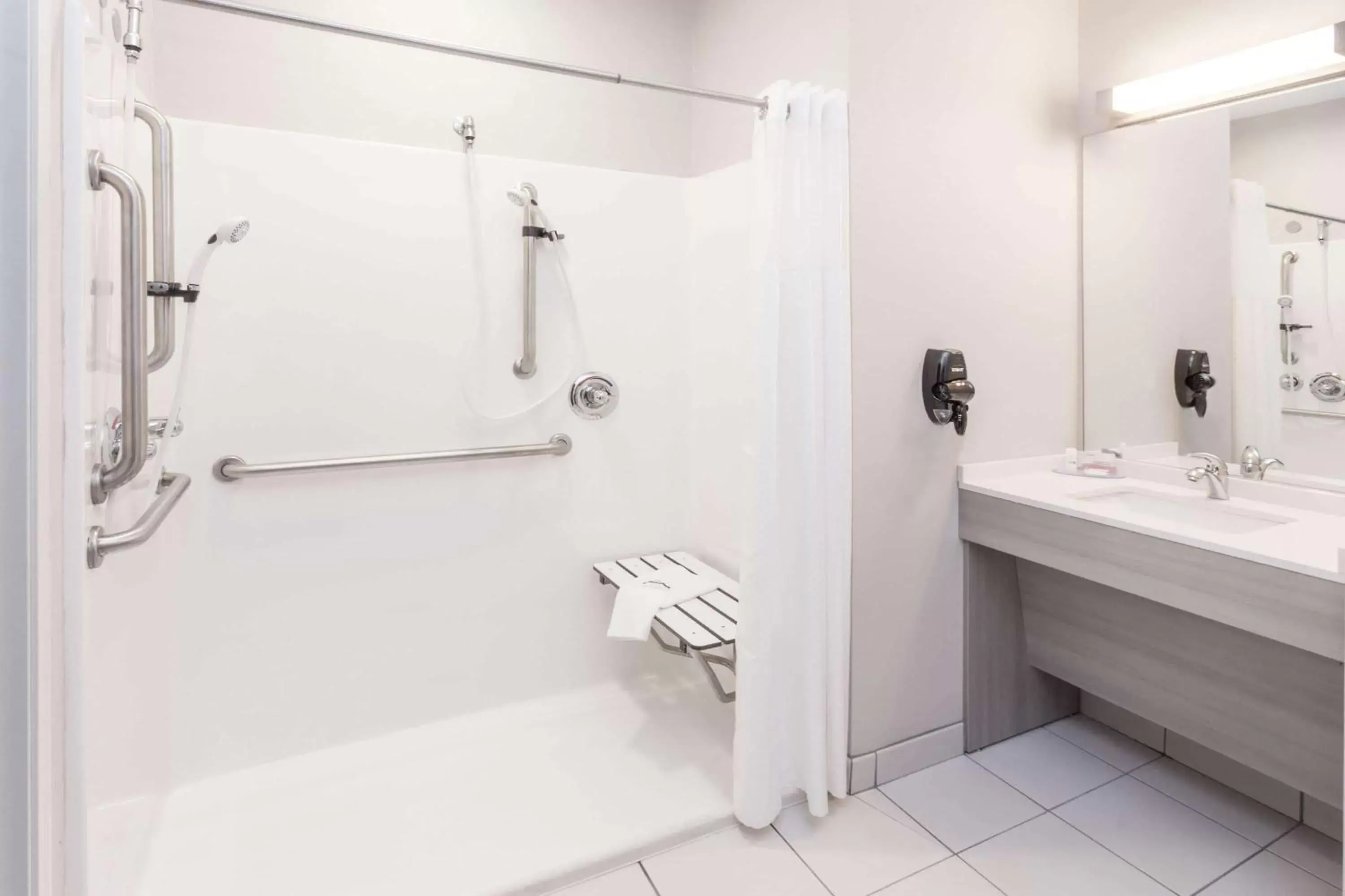 Bathroom in Microtel Inn & Suites by Wyndham West Fargo Near Medical Center