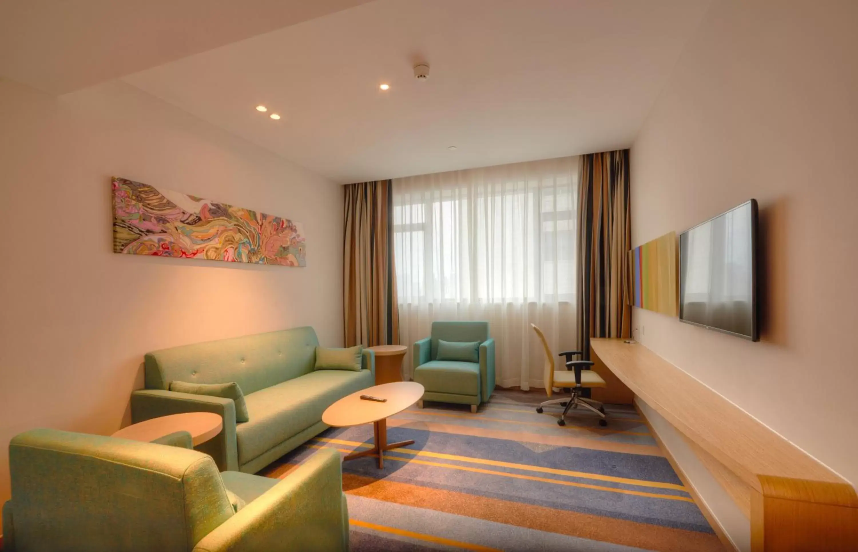 Living room, Seating Area in Holiday Inn Express Shanghai Zhenping, an IHG Hotel