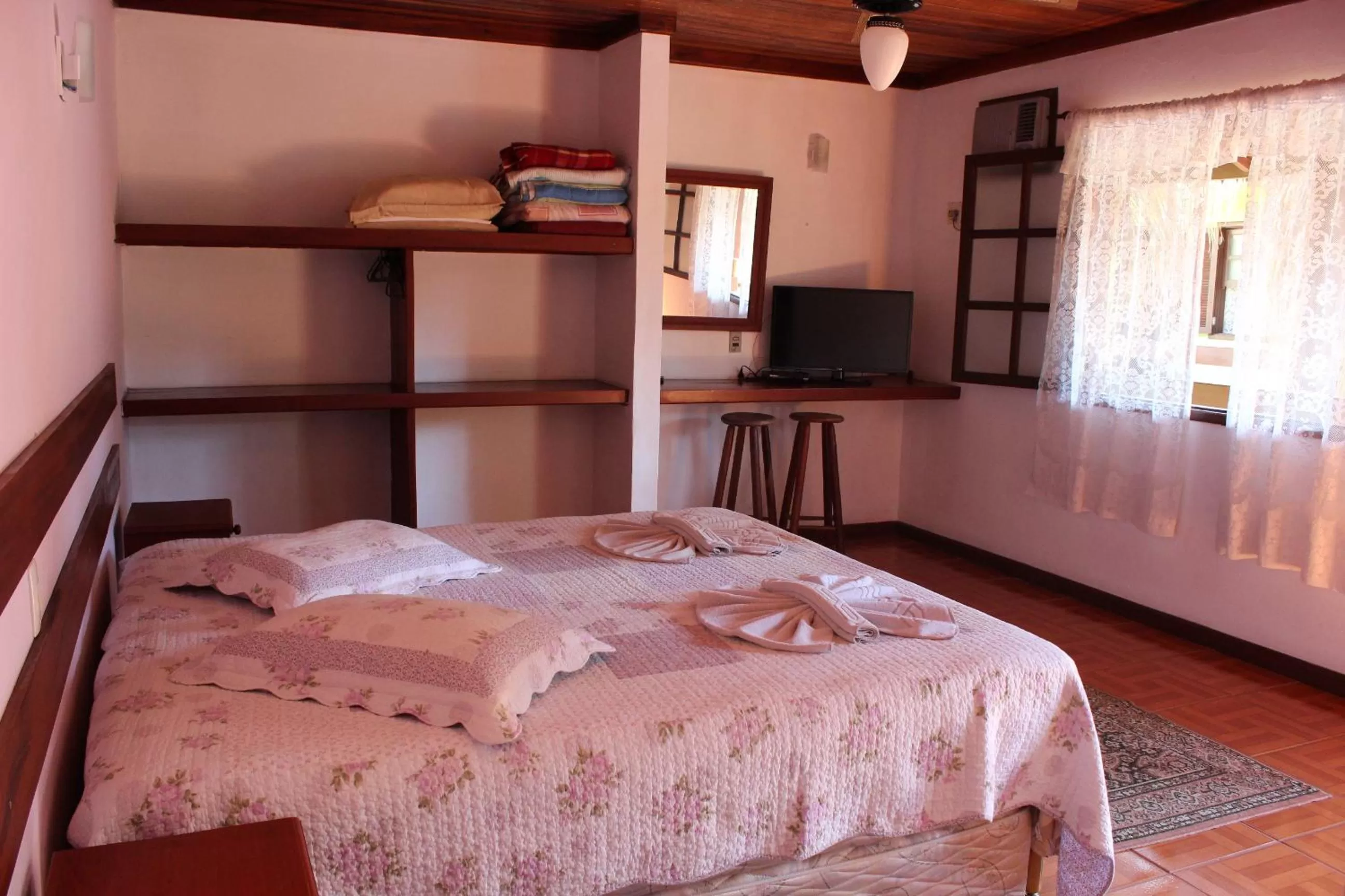 Bed in Pousada Flor de Paraty