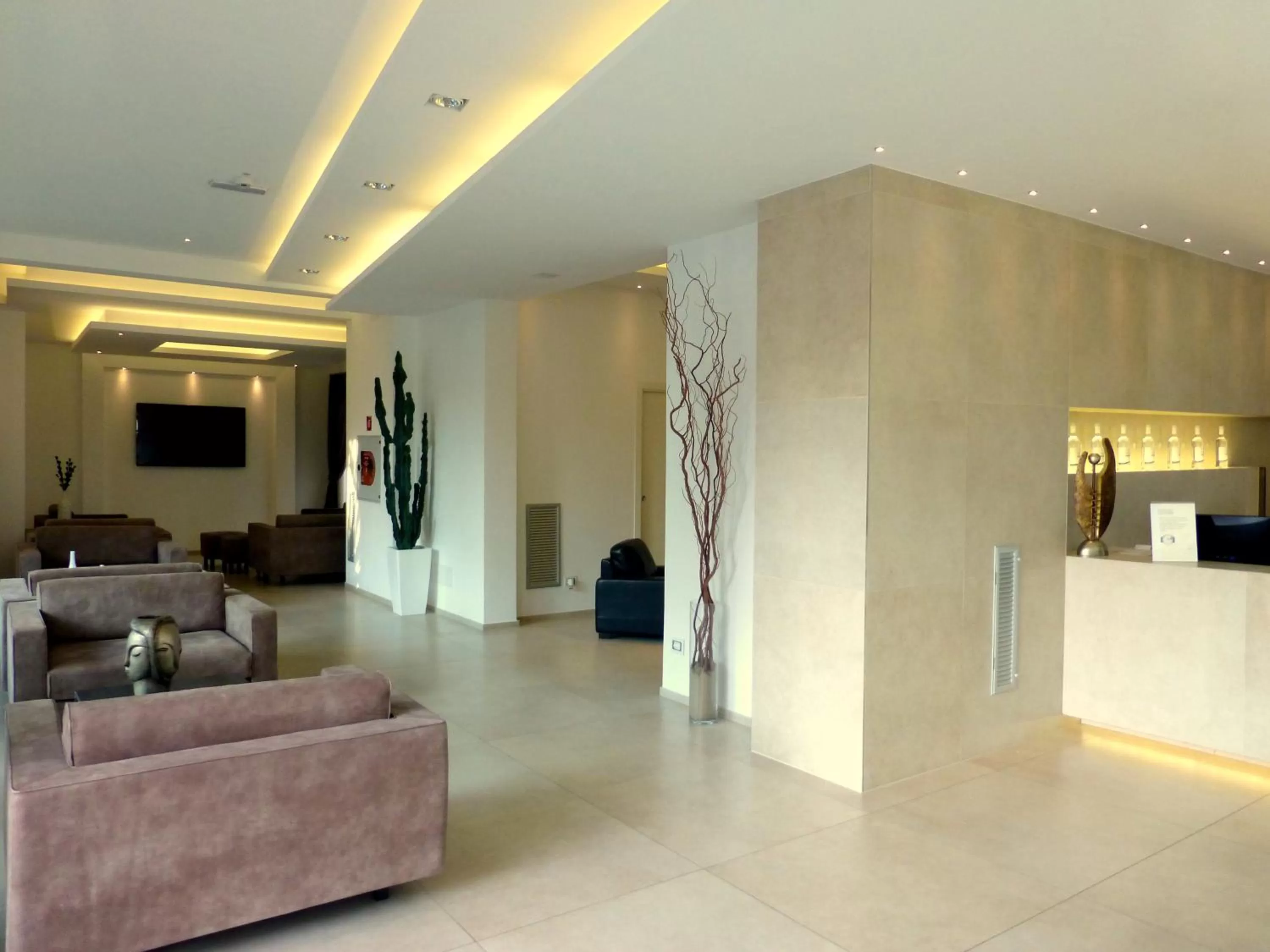 Communal lounge/ TV room in Baldinini Hotel