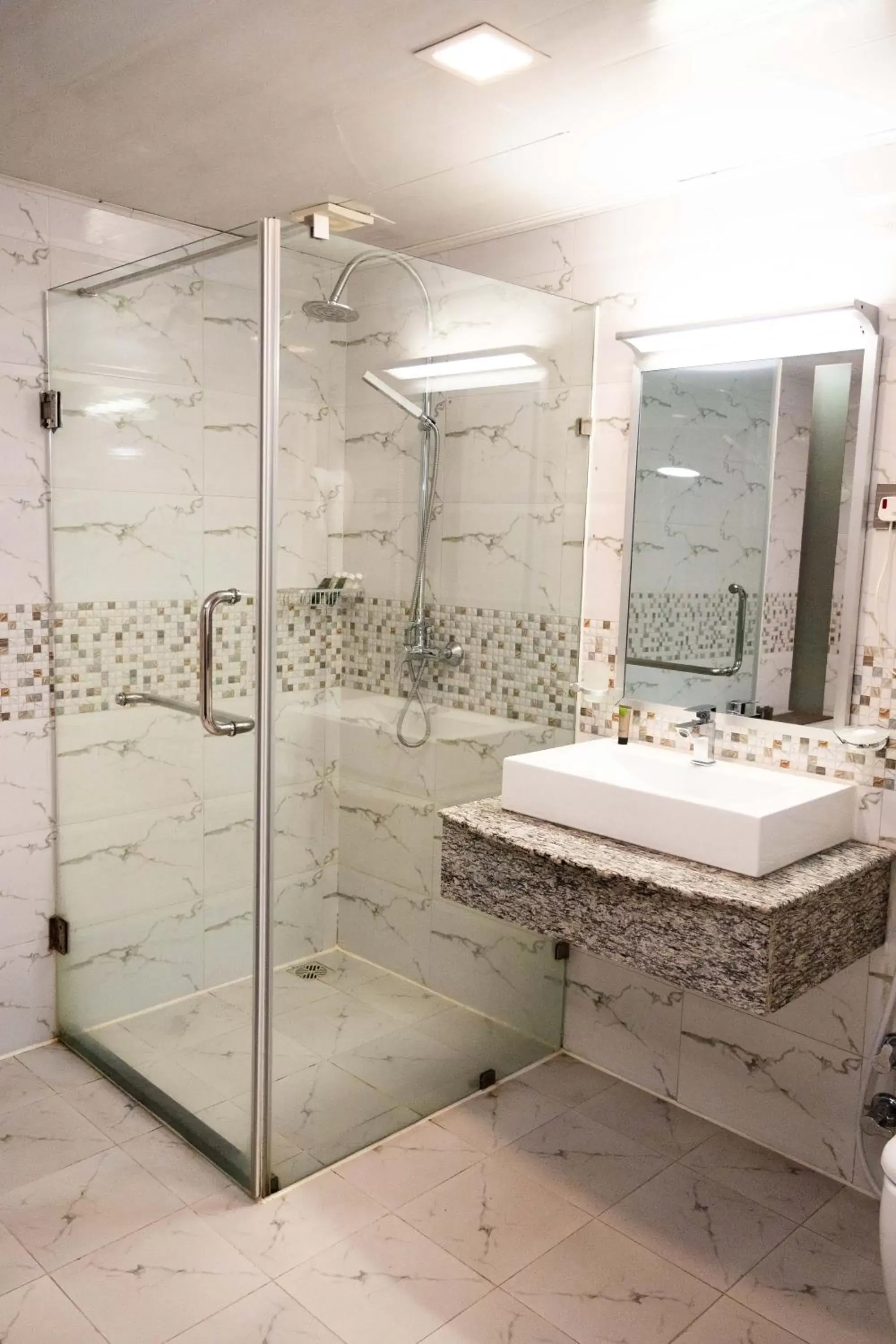 Shower, Bathroom in Golden Tulip Dar Es Salaam City Center Hotel