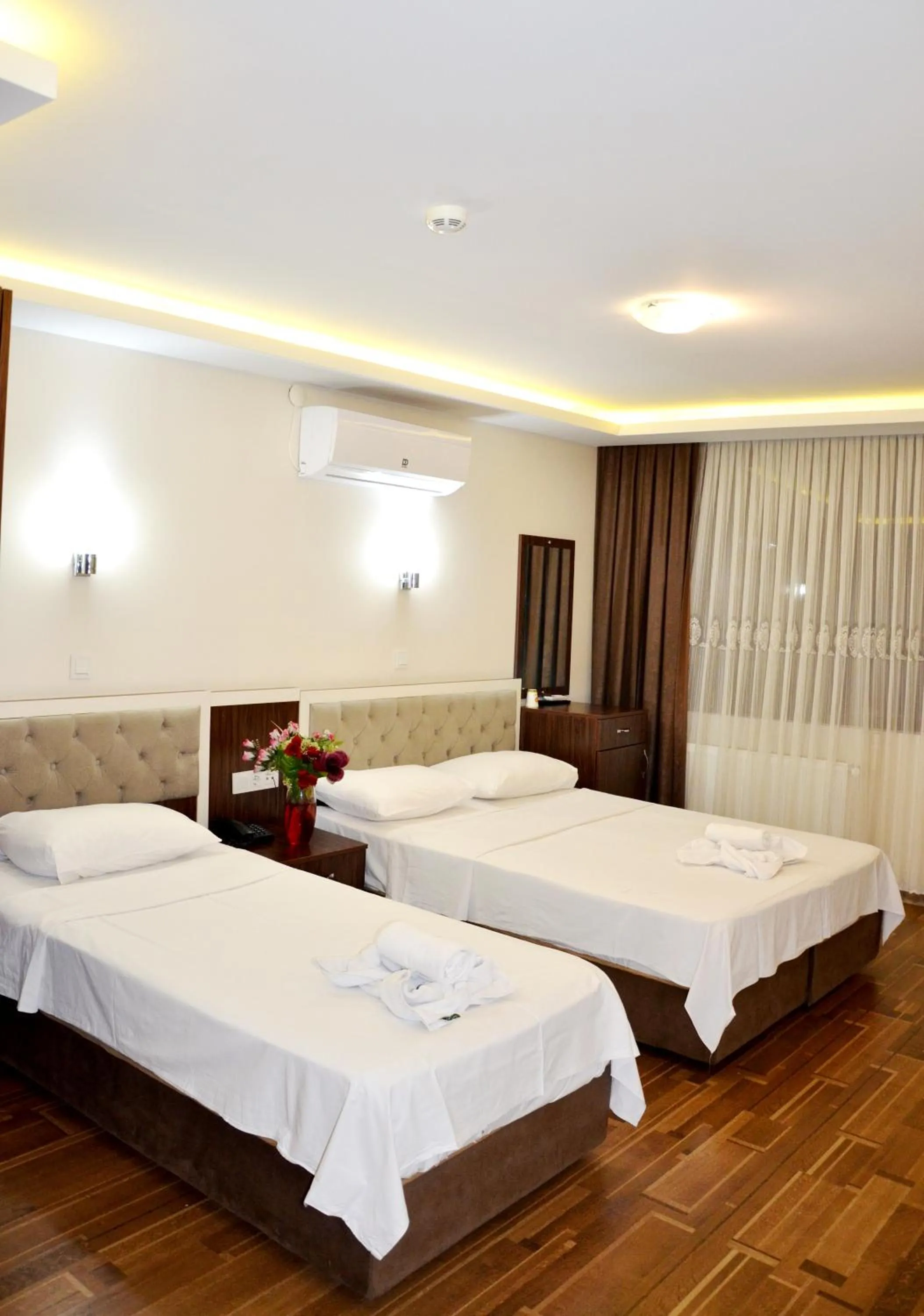 Bed in Hotel Grand Mark