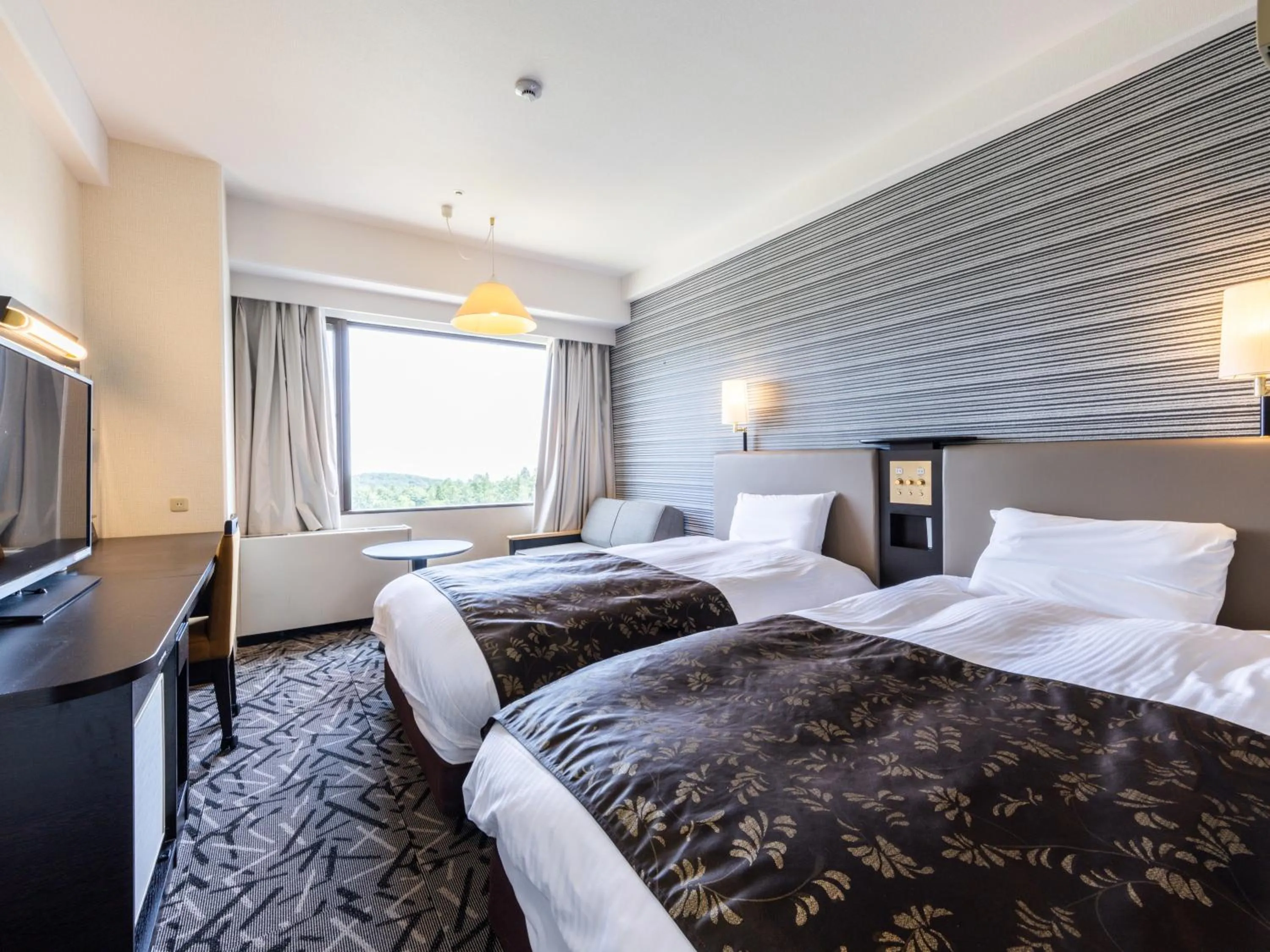 Photo of the whole room, Bed in APA Hotel & Resort Joetsu Myoko