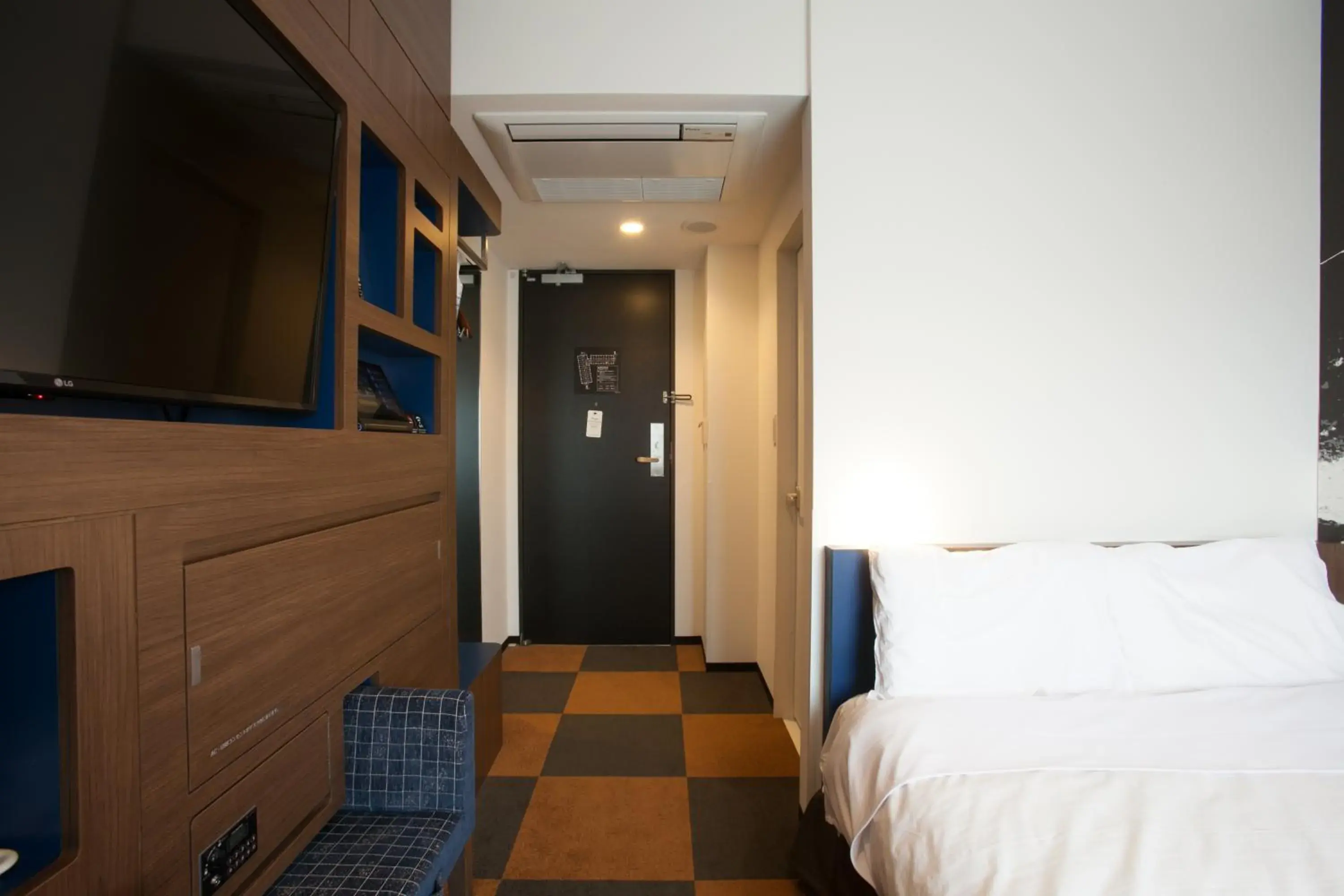 Communal lounge/ TV room, Bed in Henn na Hotel Tokyo Haneda