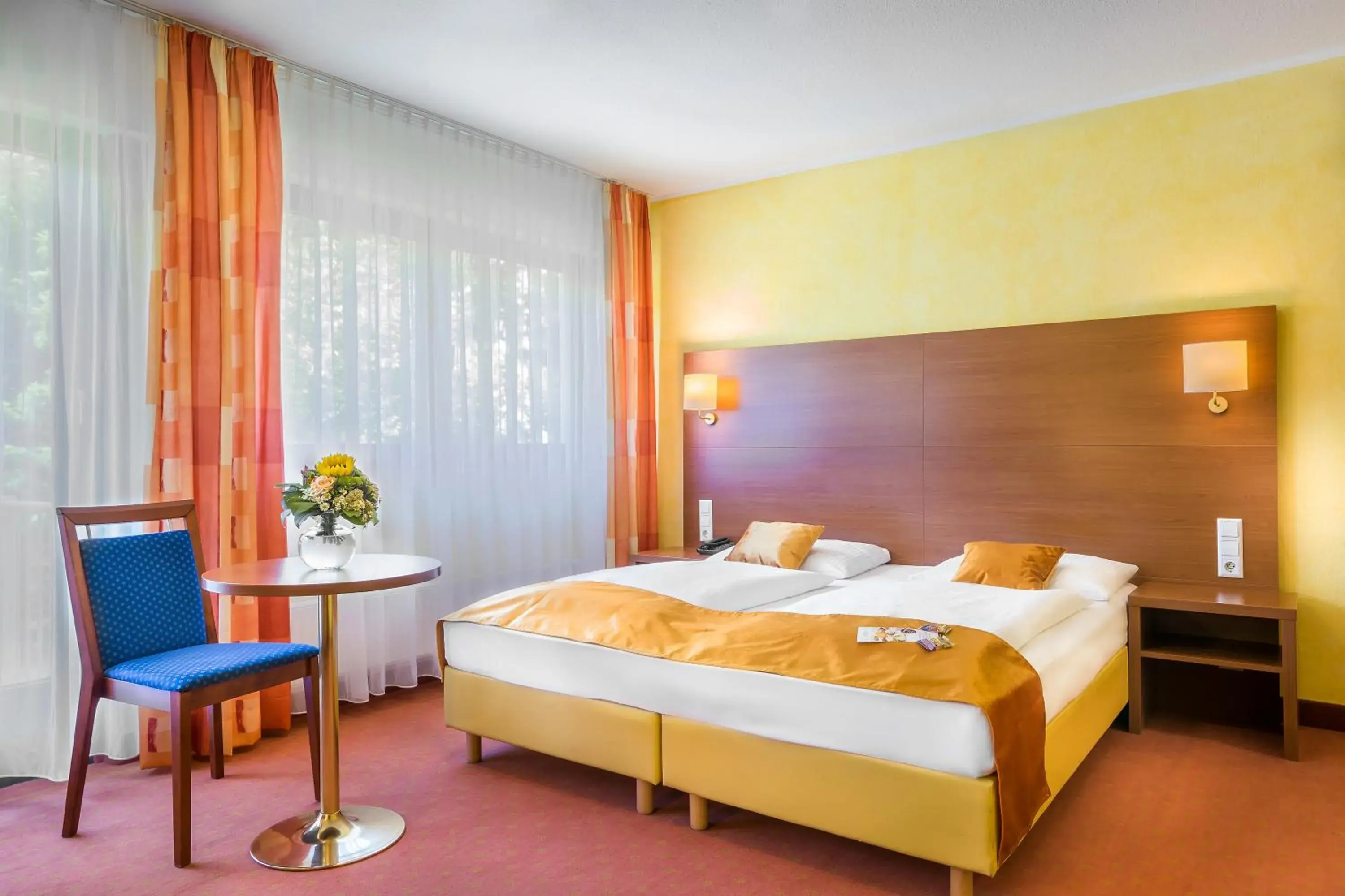 Photo of the whole room, Bed in Novum Hotel Rega Stuttgart