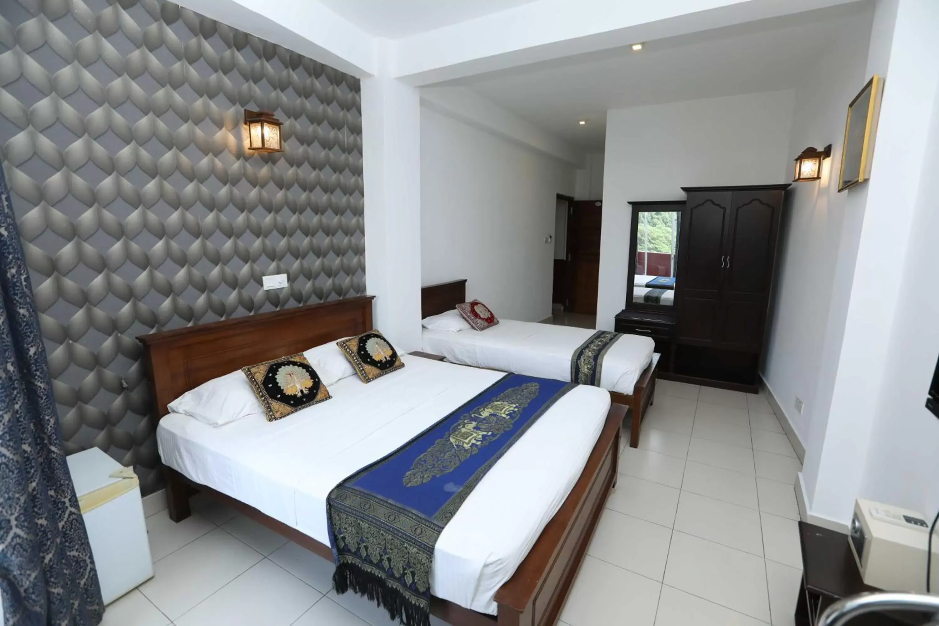 Bed in Kandy Supreme Hotel