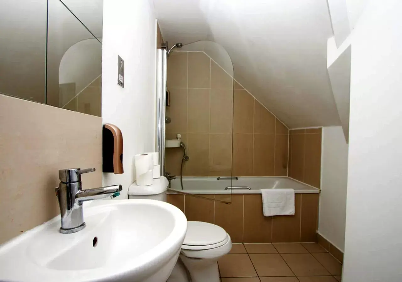 Bathroom in Westciti Caroco Aparthotel