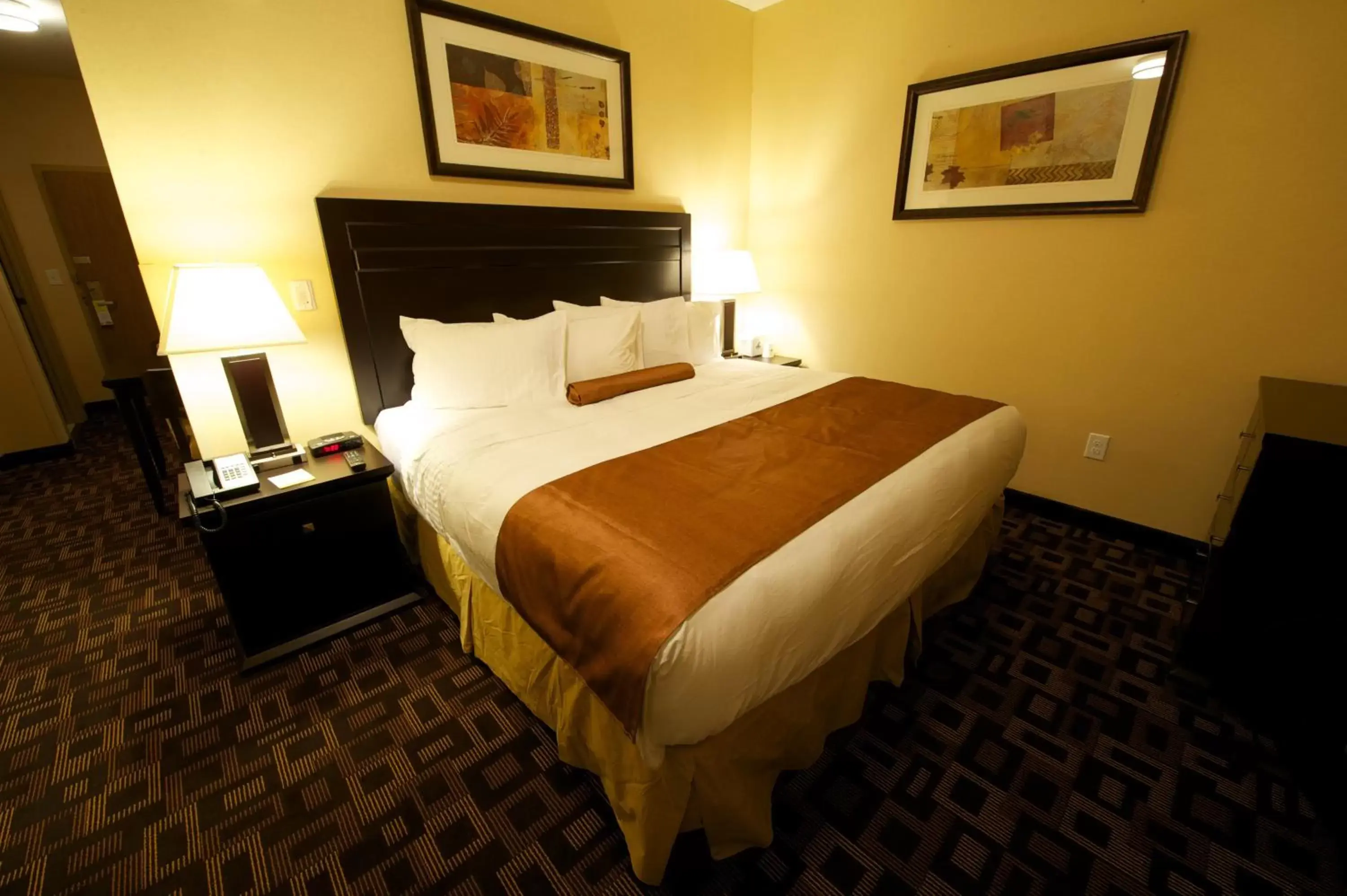 Bed in Days Inn & Suites by Wyndham Winnipeg Airport Manitoba