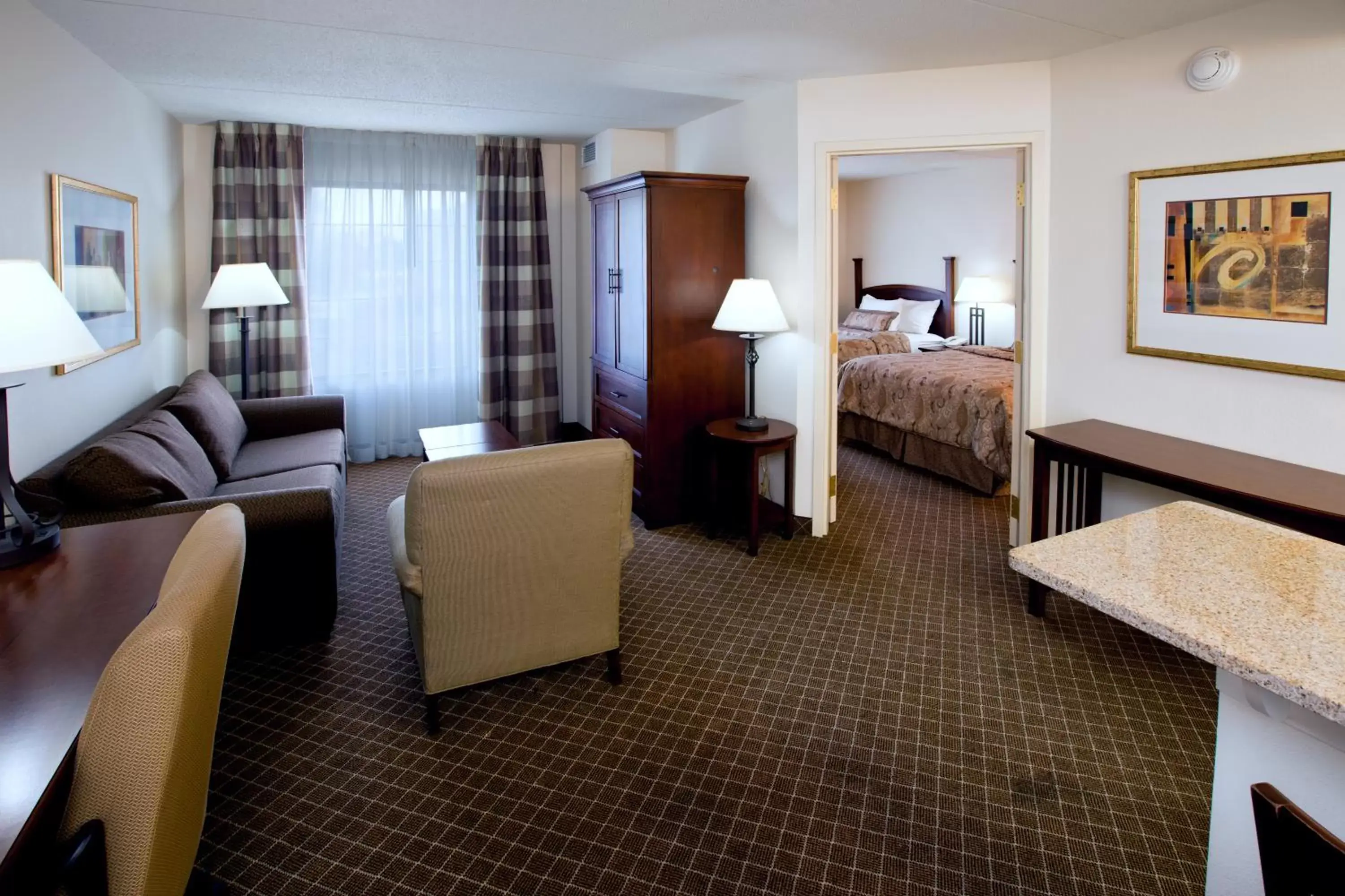 Living room, Seating Area in Staybridge Suites Indianapolis-Airport, an IHG Hotel