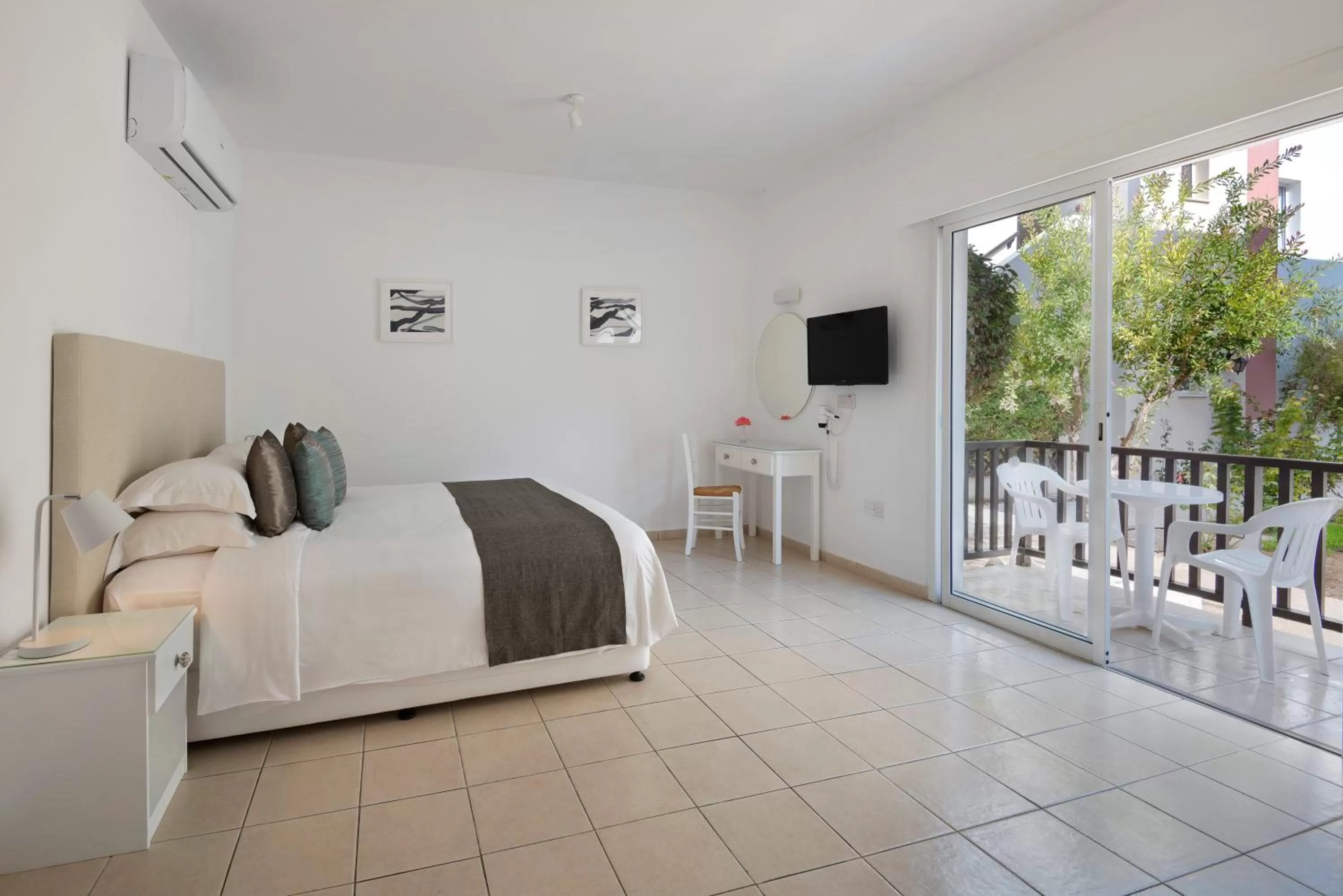 Bed in Akti Beach Hotel & Village Resort