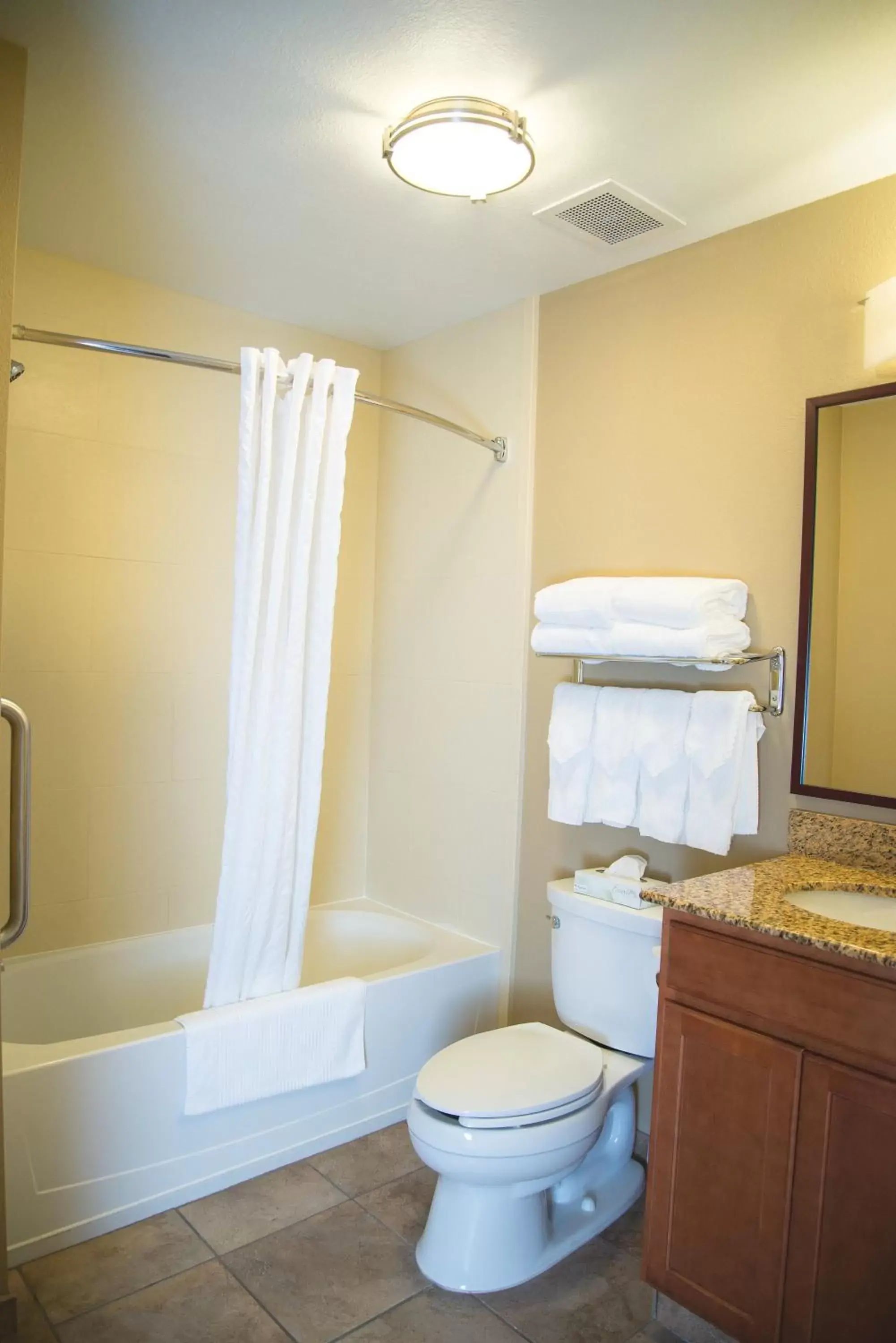 Bedroom, Bathroom in Candlewood Suites Loveland, an IHG Hotel