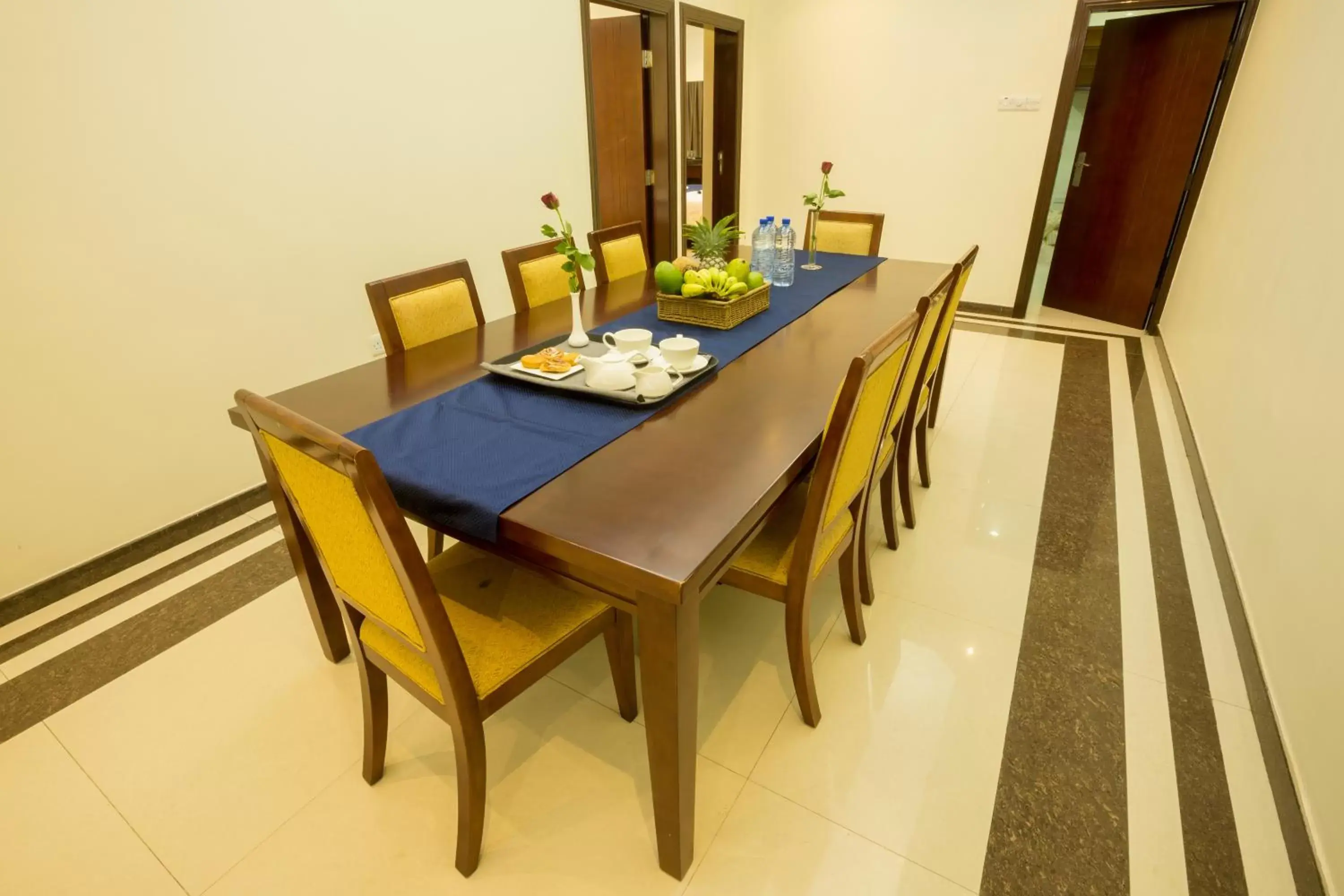 Living room, Dining Area in Tanzanite Executive Suites