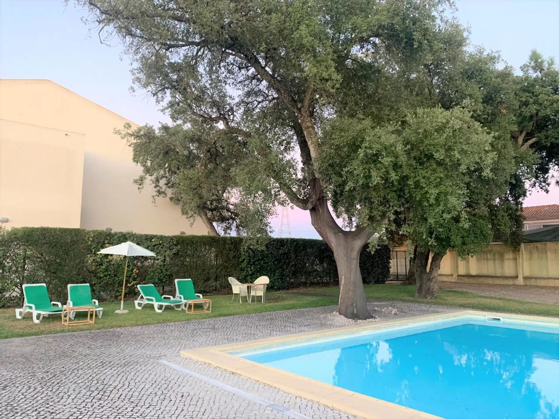 Swimming pool in Amazonia Palmela Apartamentos Turisticos