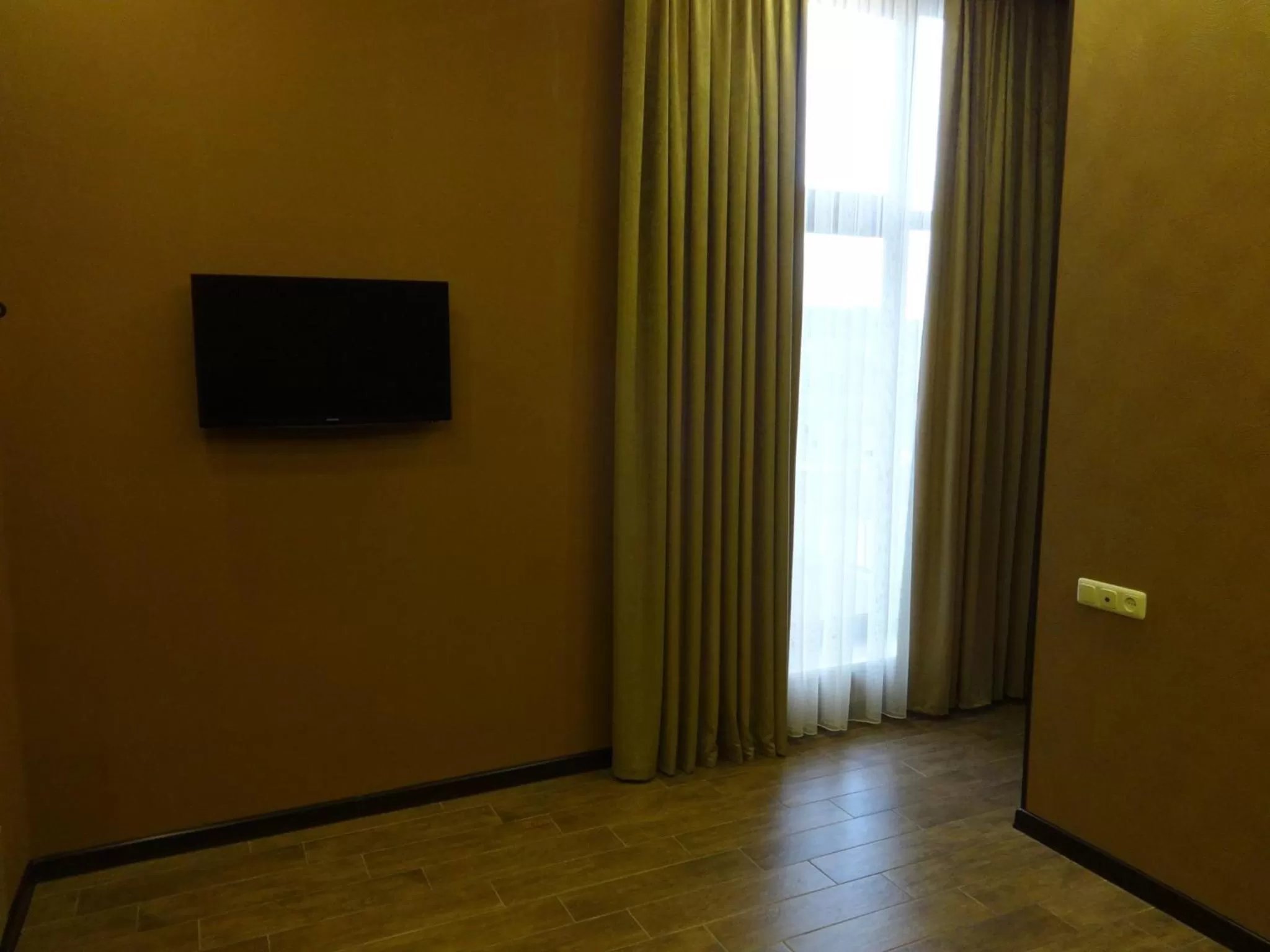 TV and multimedia, TV/Entertainment Center in Eridana Hotel