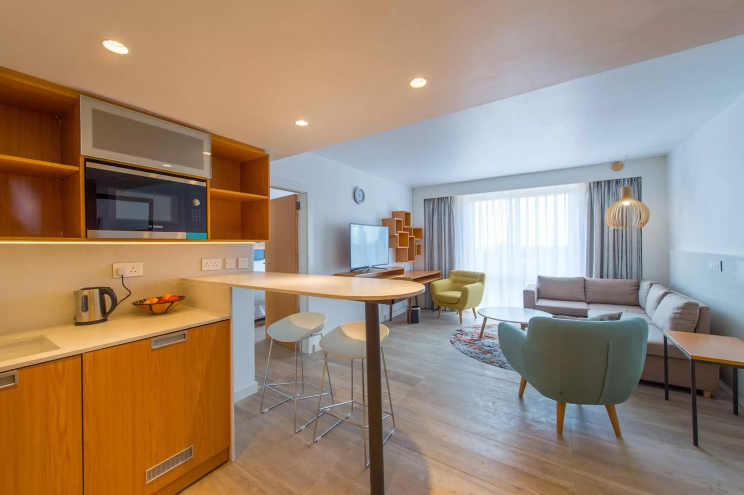 Photo of the whole room, Kitchen/Kitchenette in Holiday Inn - Lusaka, an IHG Hotel