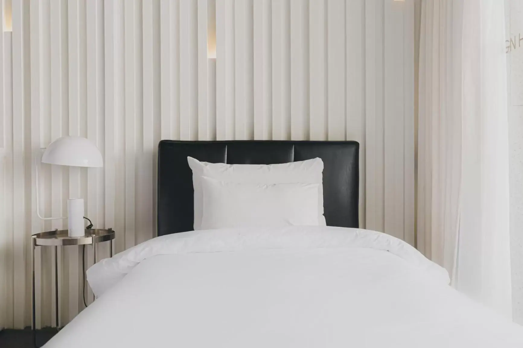 Bed in ACC Design Hotel