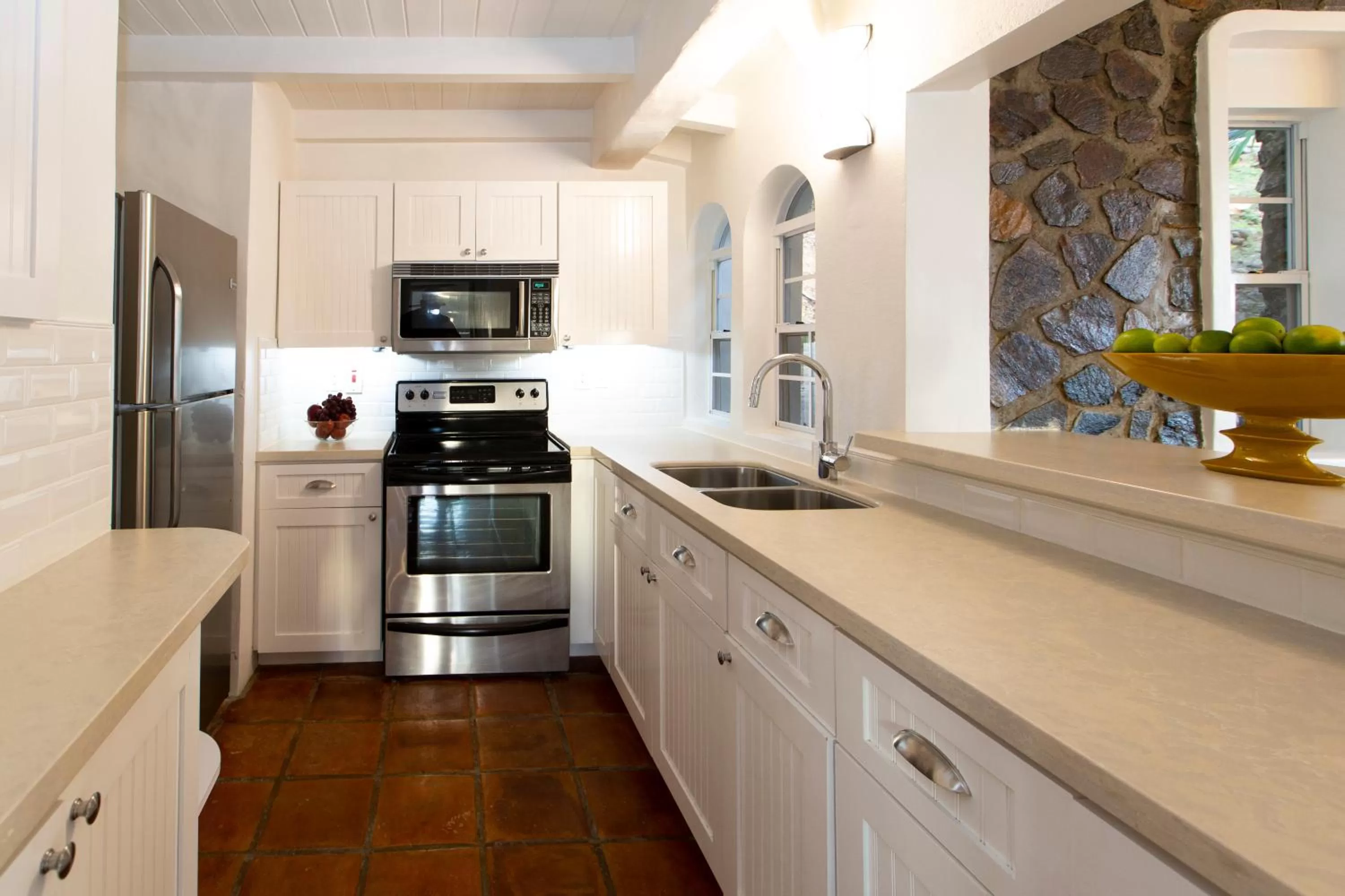 Kitchen or kitchenette in Windjammer Landing Resort and Residences