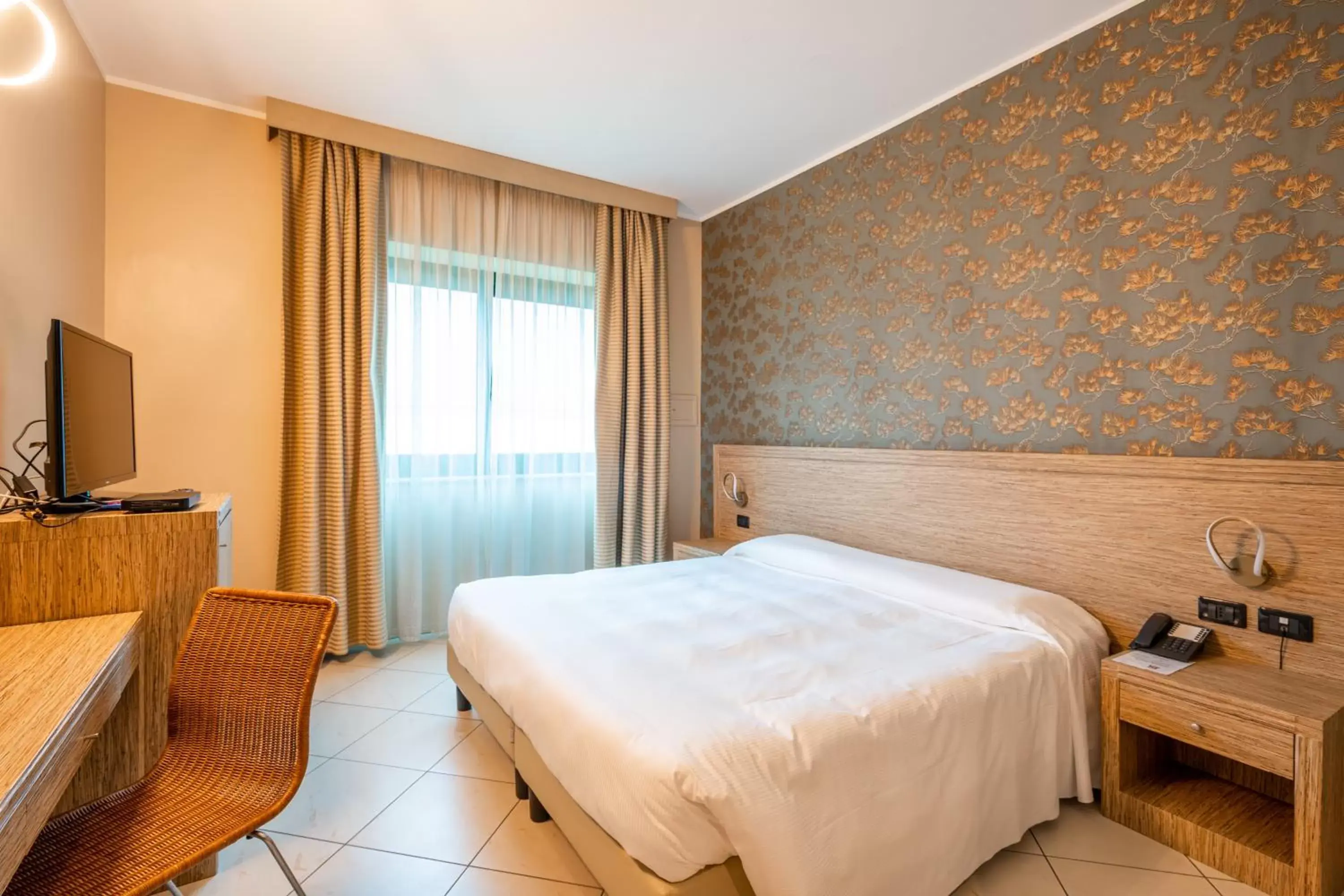 Bed in Hotel Parisi