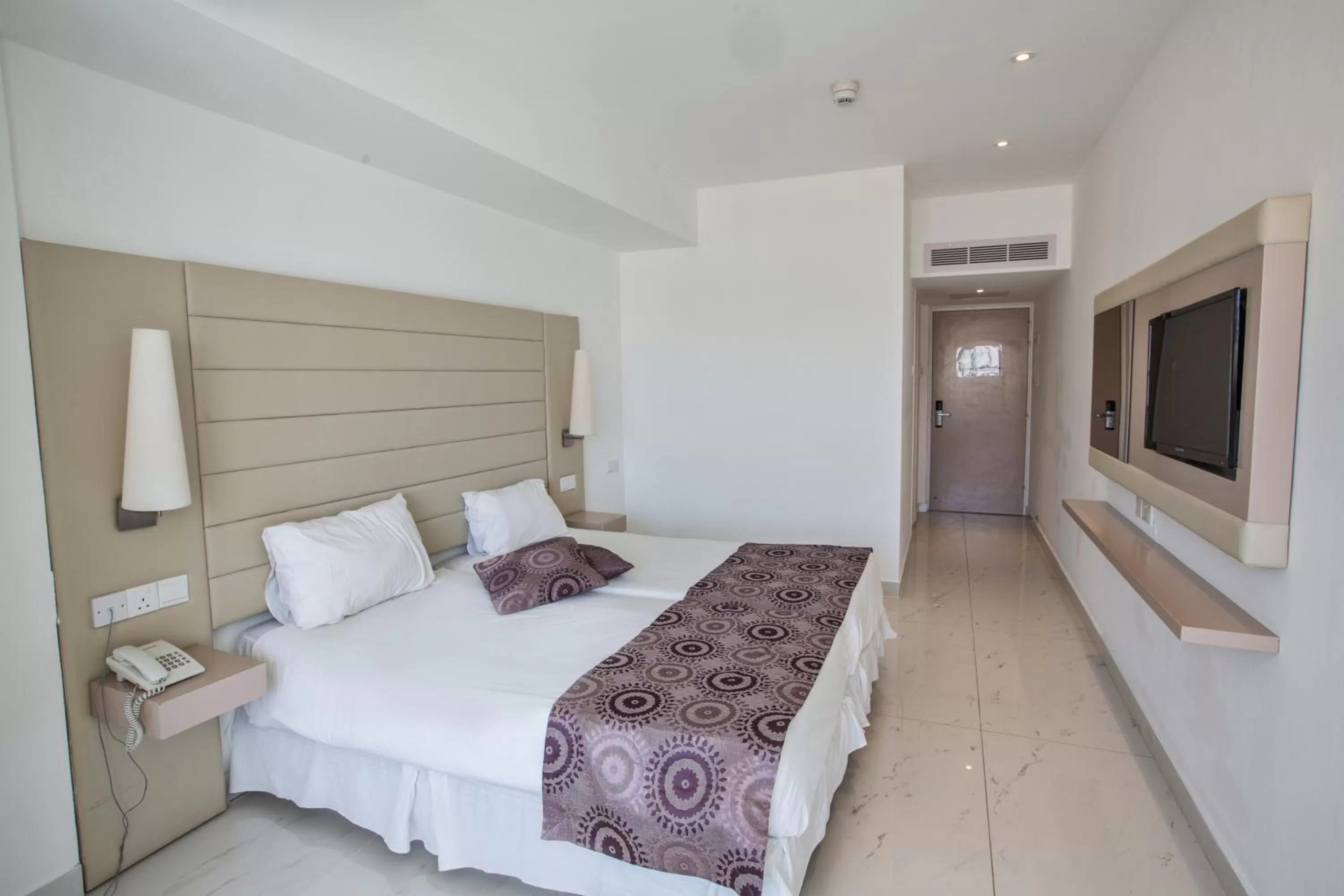 Bed in Tsokkos Protaras Beach Hotel