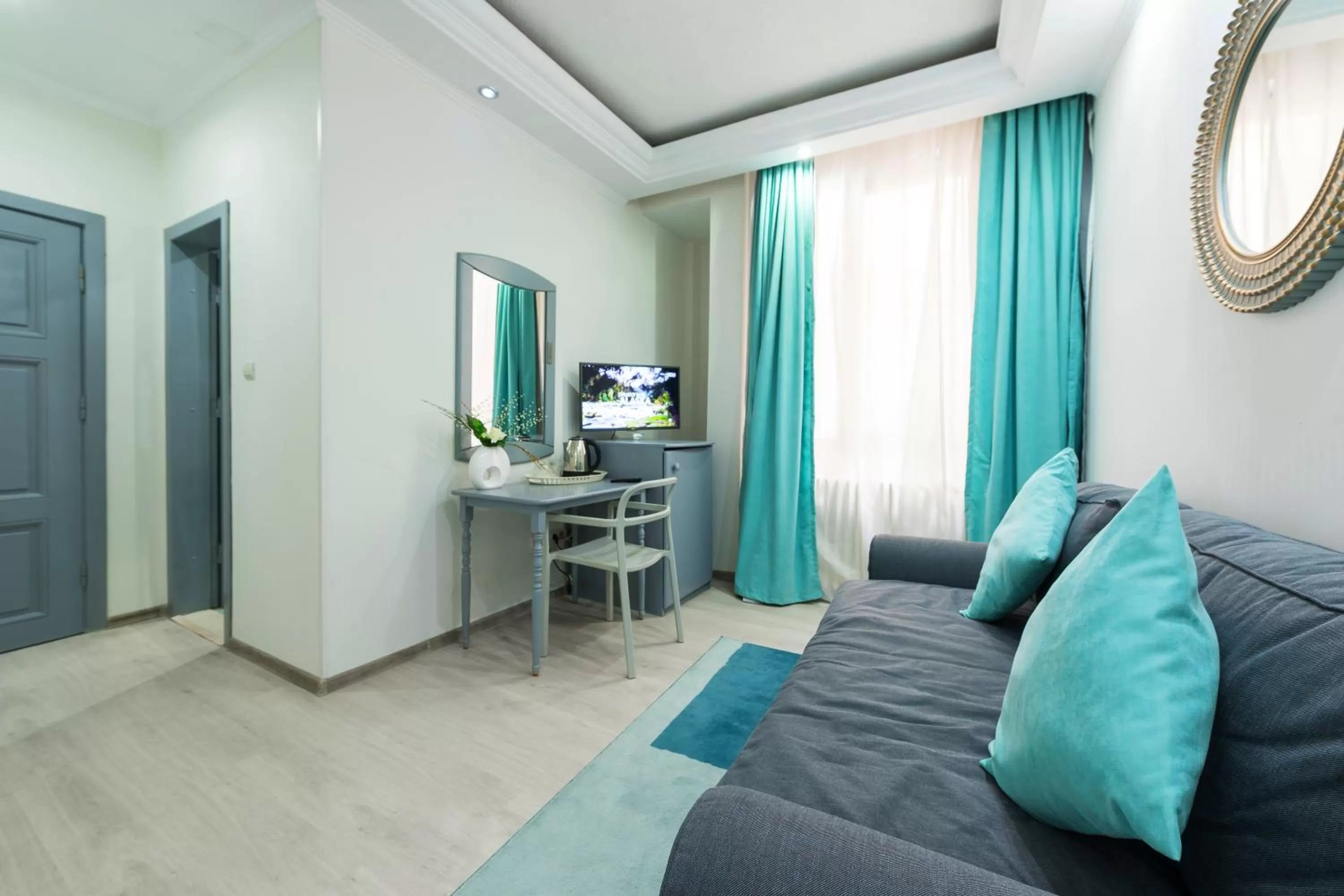 Bed in Relax Comfort Suites Hotel