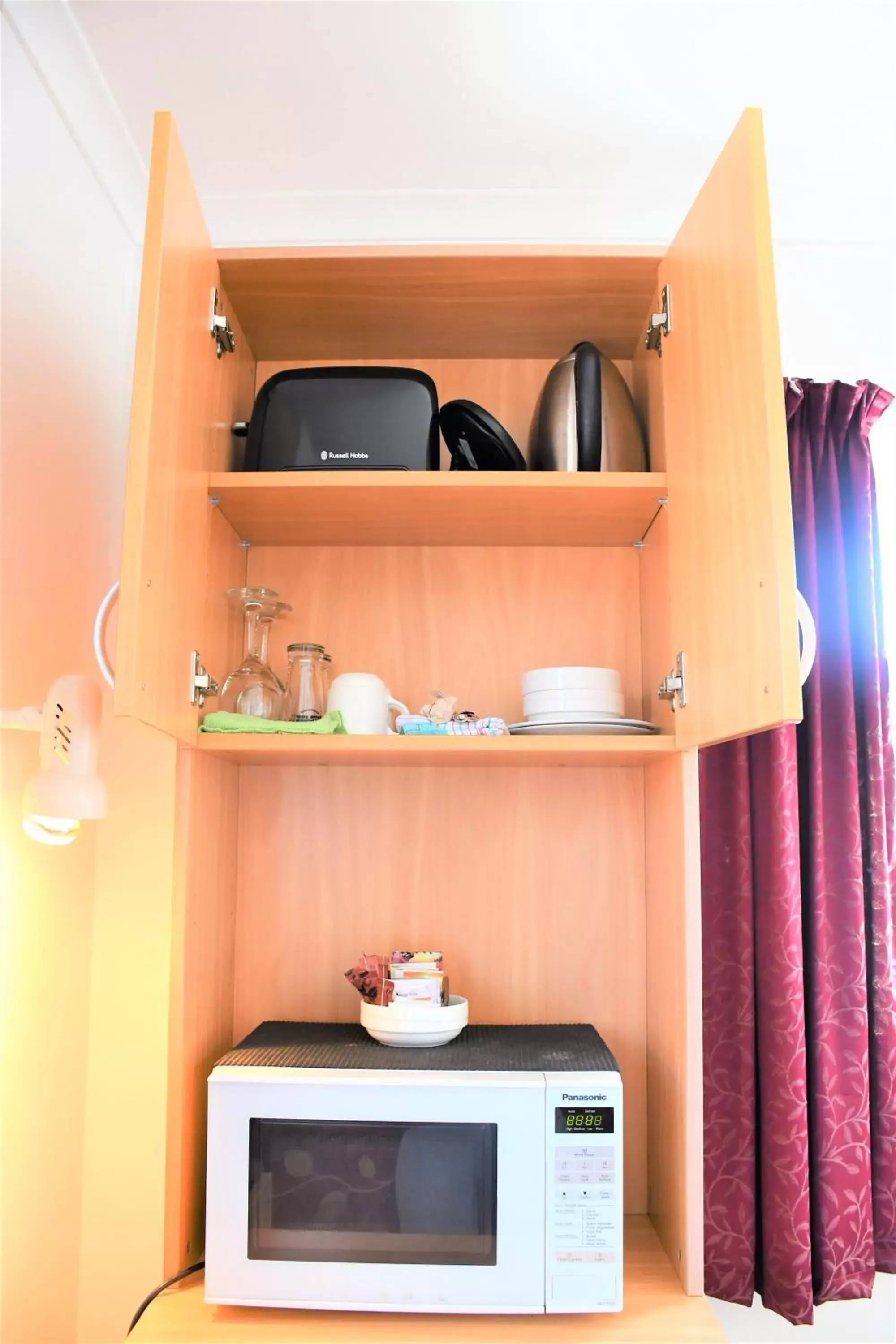 Kitchen/Kitchenette in Comfort Inn Westshore Beach