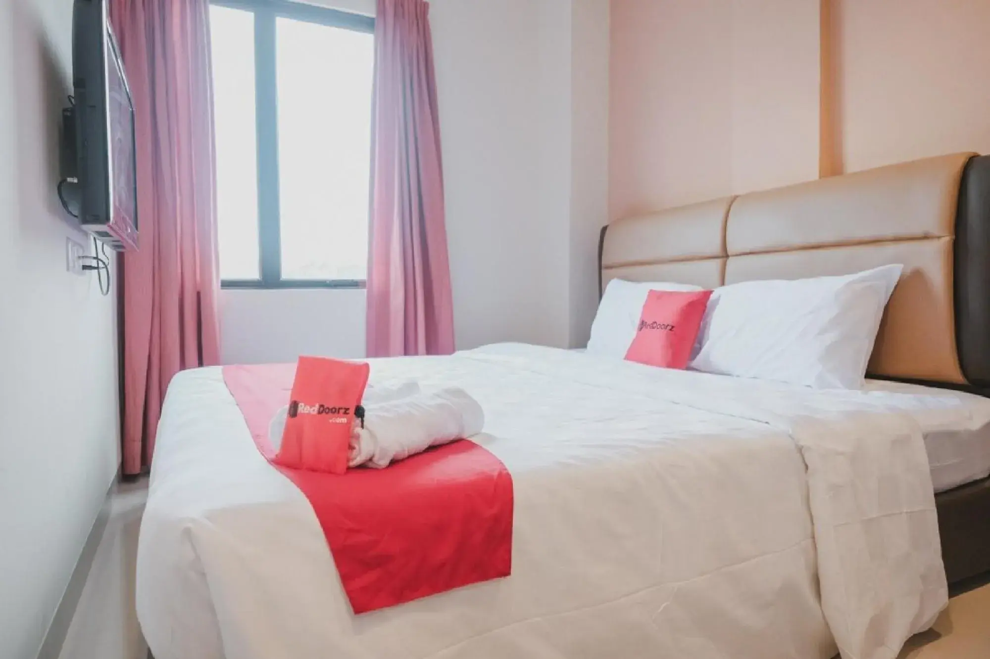 Bed in RedDoorz Plus near Ferry Terminal Batam Center