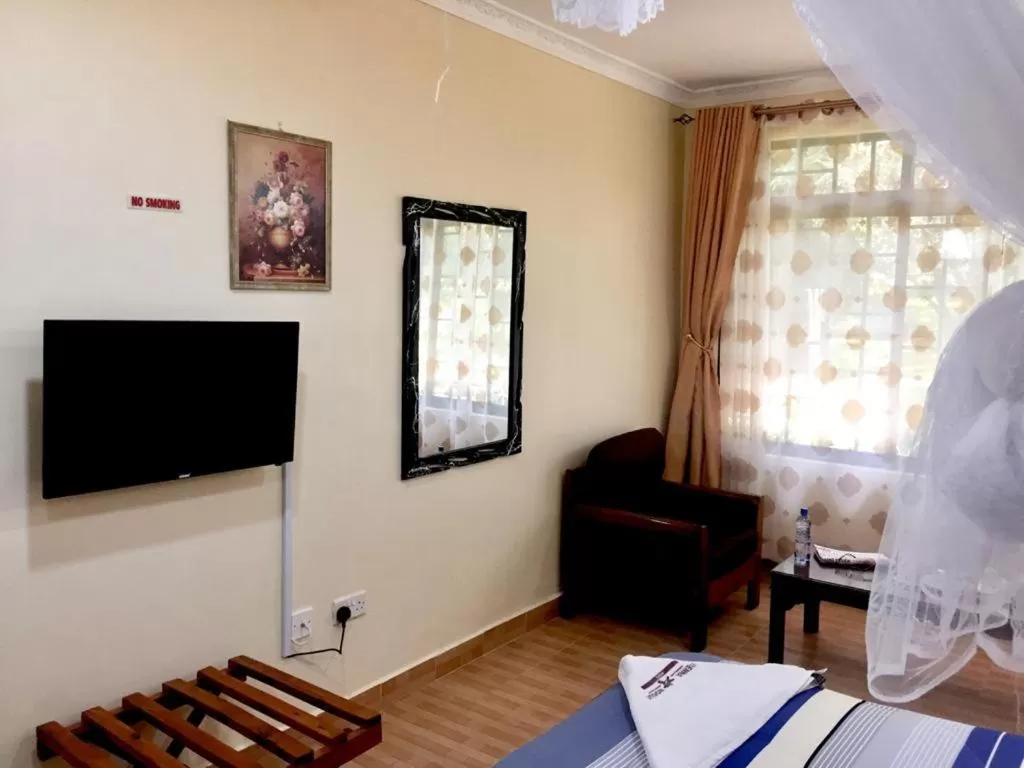 TV and multimedia, TV/Entertainment Center in Vienna Woods Hotel Nakuru