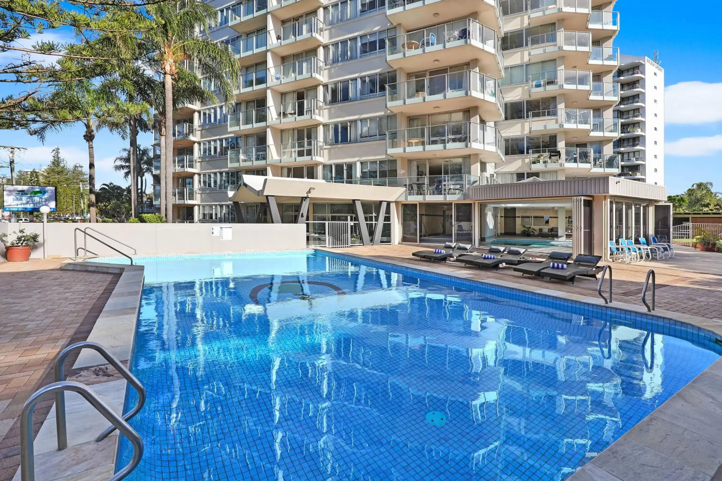 Property building, Swimming Pool in Pacific Regis Beachfront Holiday Apartments